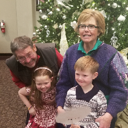 Mary Ann, Don, and grandchildren Vaughn and Mira, Christmas of 2018