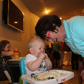 Mary Ann and her oldest grandson, Vaughn, at Vaughn's first birthday party - August 2013