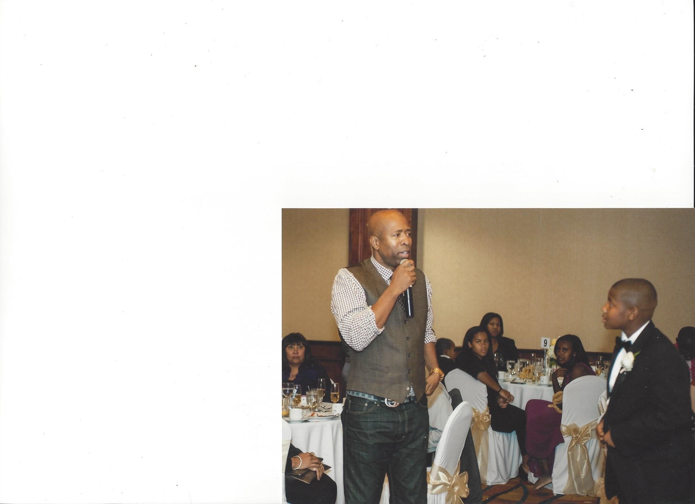 Kenny Smith speaking at the 50th wedding anniversary