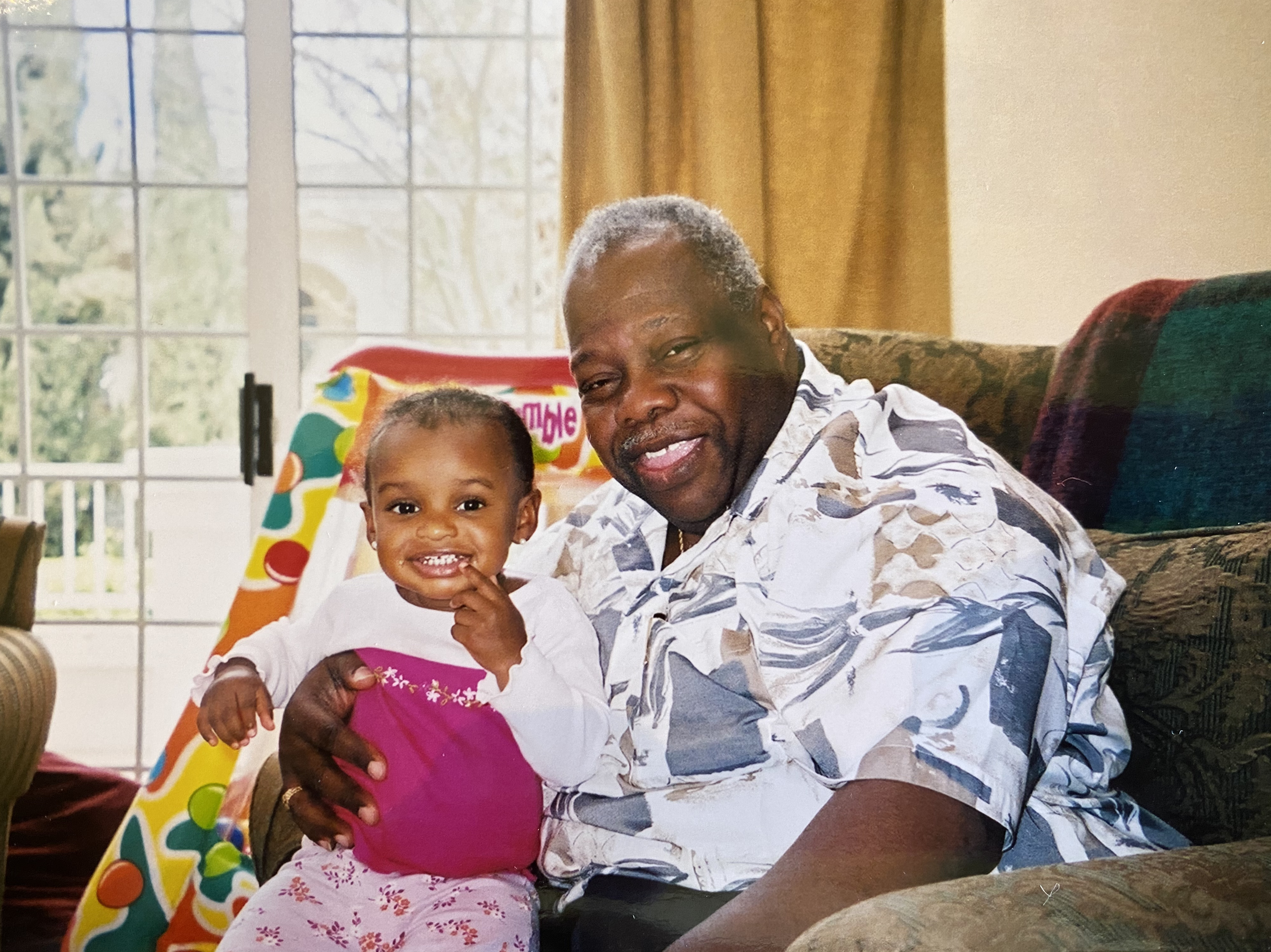 Cami with grandpa, loving those big hugs.