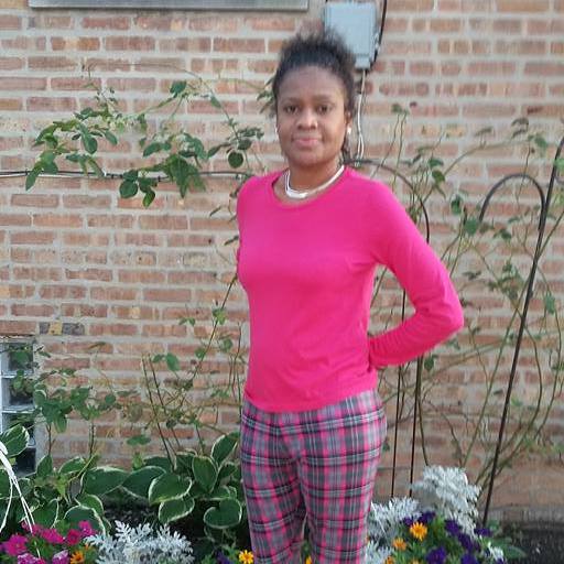 Kelli at home in her backyard.