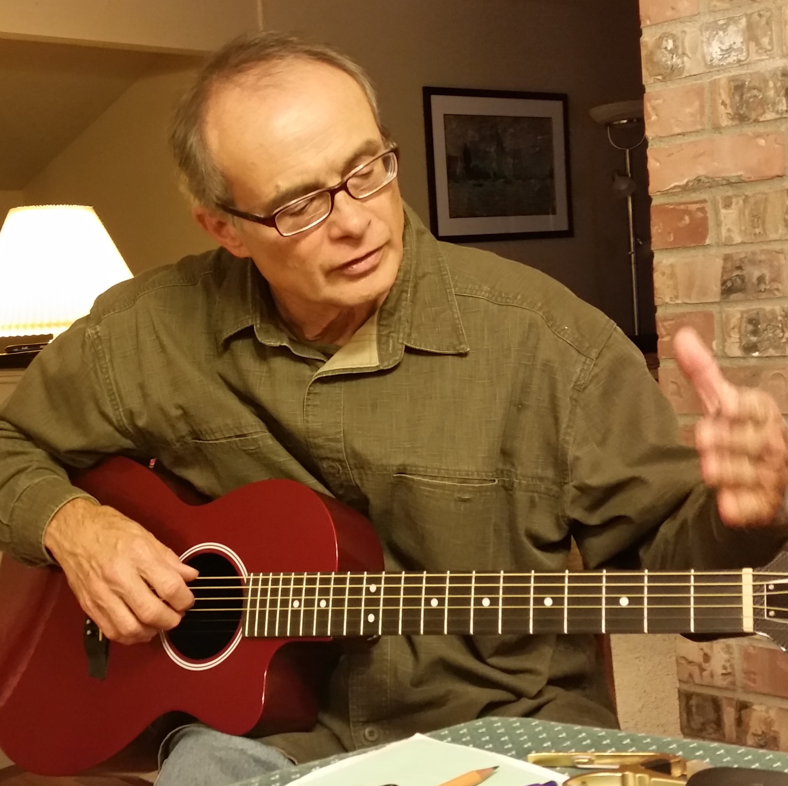 Marty playing his guitar