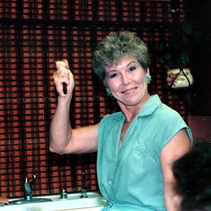This picture is the embodiment
of my Mom - beautiful, silly, sassy and a bit badass! Yes, that's a knife in her hand.