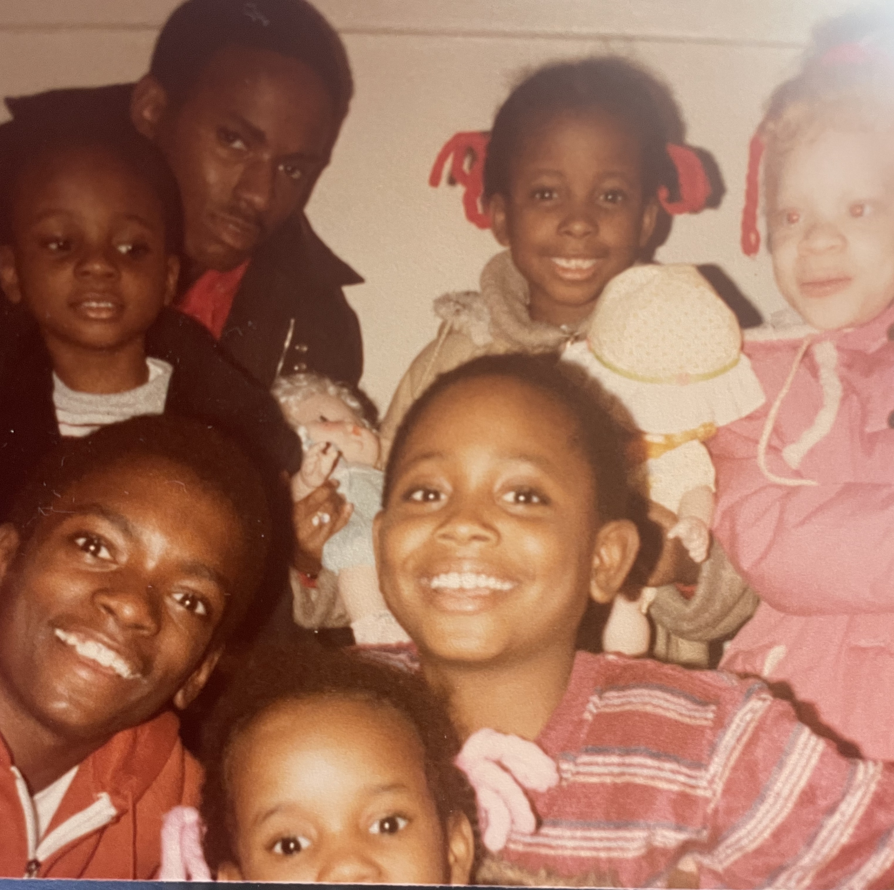 Big cuz in the back not looking thrilled