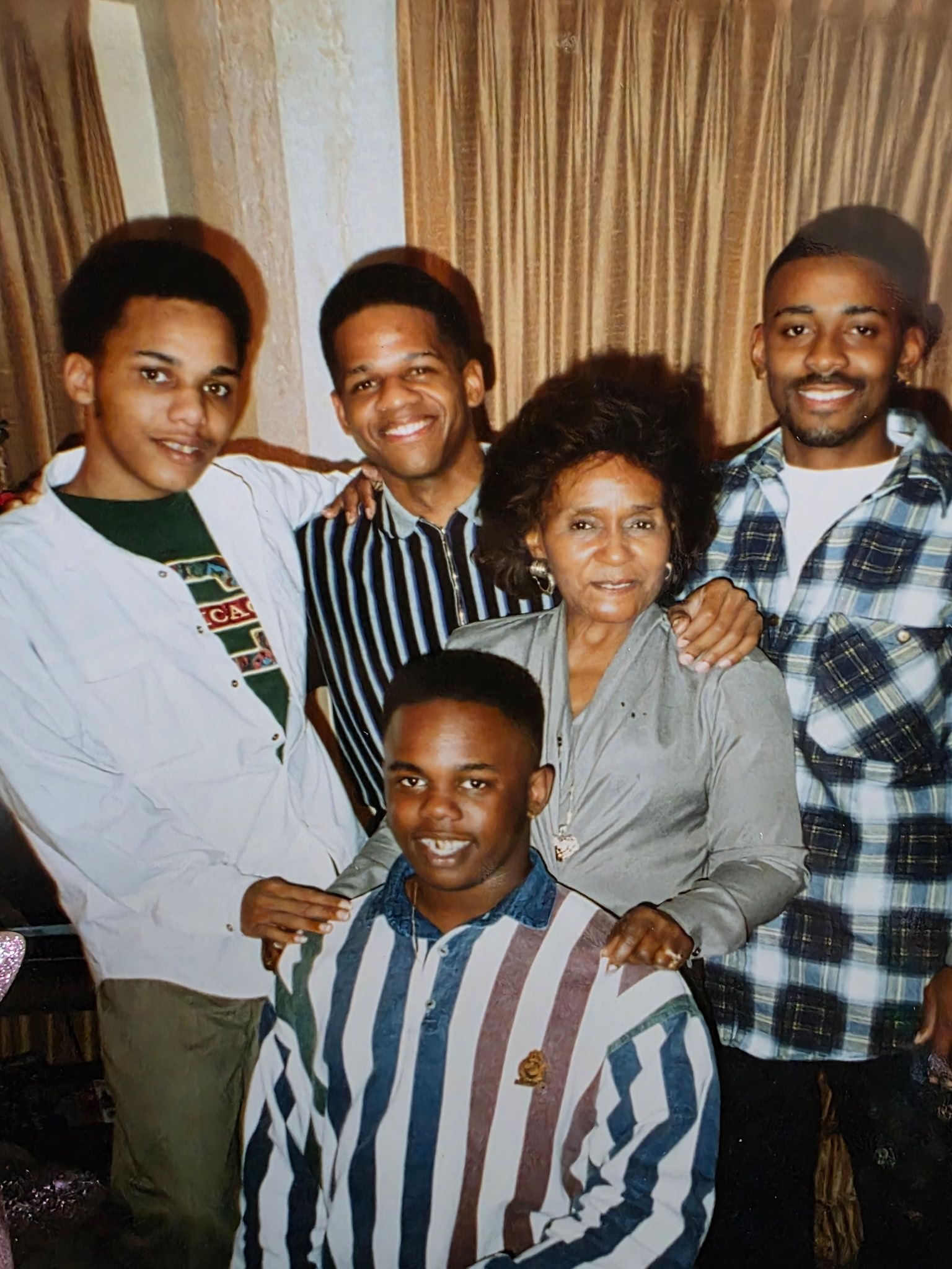 Ernest with his grandmother, Mama Hazel, cousin, Clarence, cousin, Ed, and brother, James.