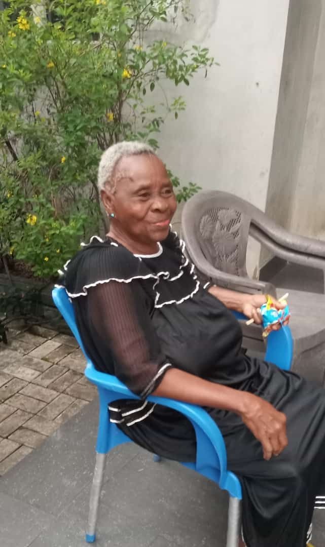 Mama enjoying fresh air at her first son's place