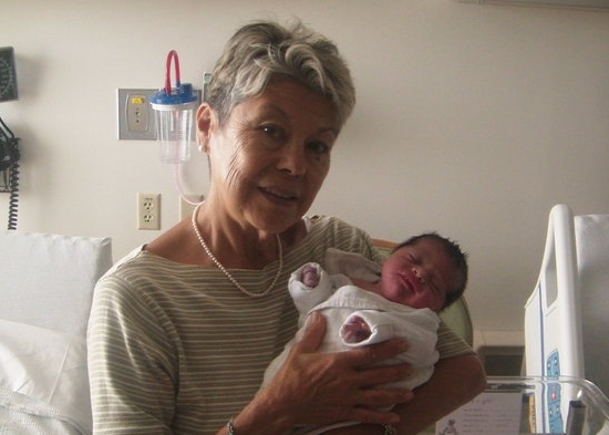 Gloria welcoming her Granddaughter Alessandra into the world