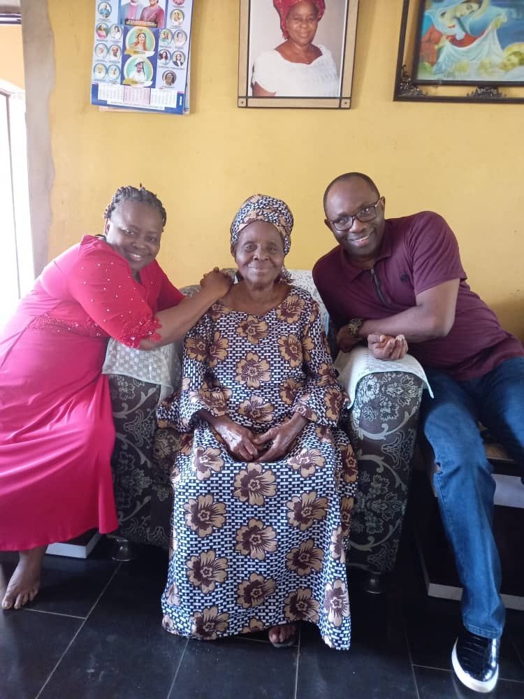 Mum with first and last children.