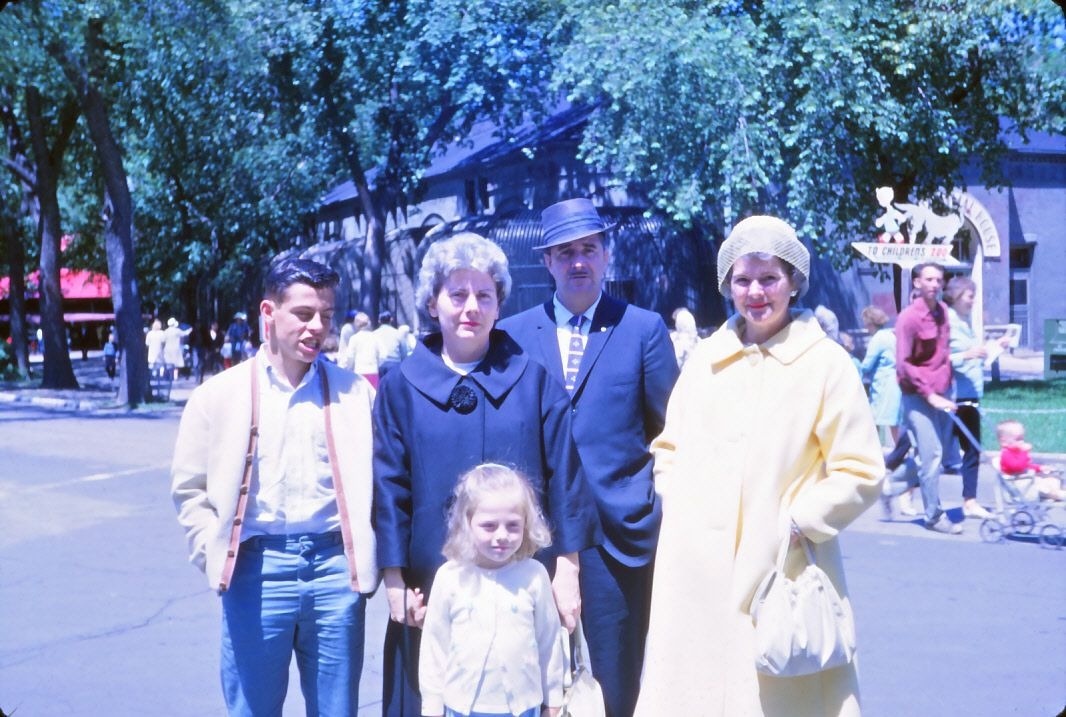 Terry with mother, next door neighbors and sister on vacation in Canada.
