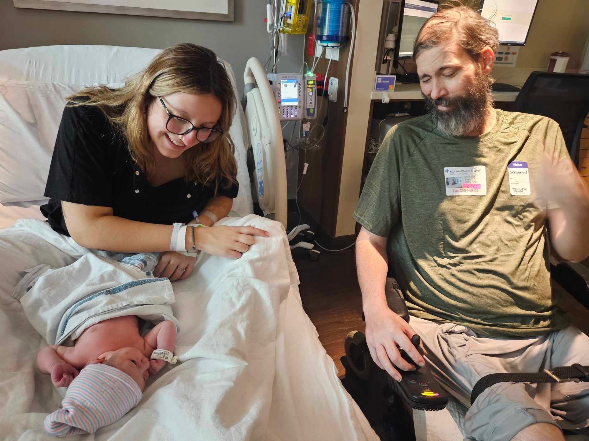 meeting his granddaughter for the first time