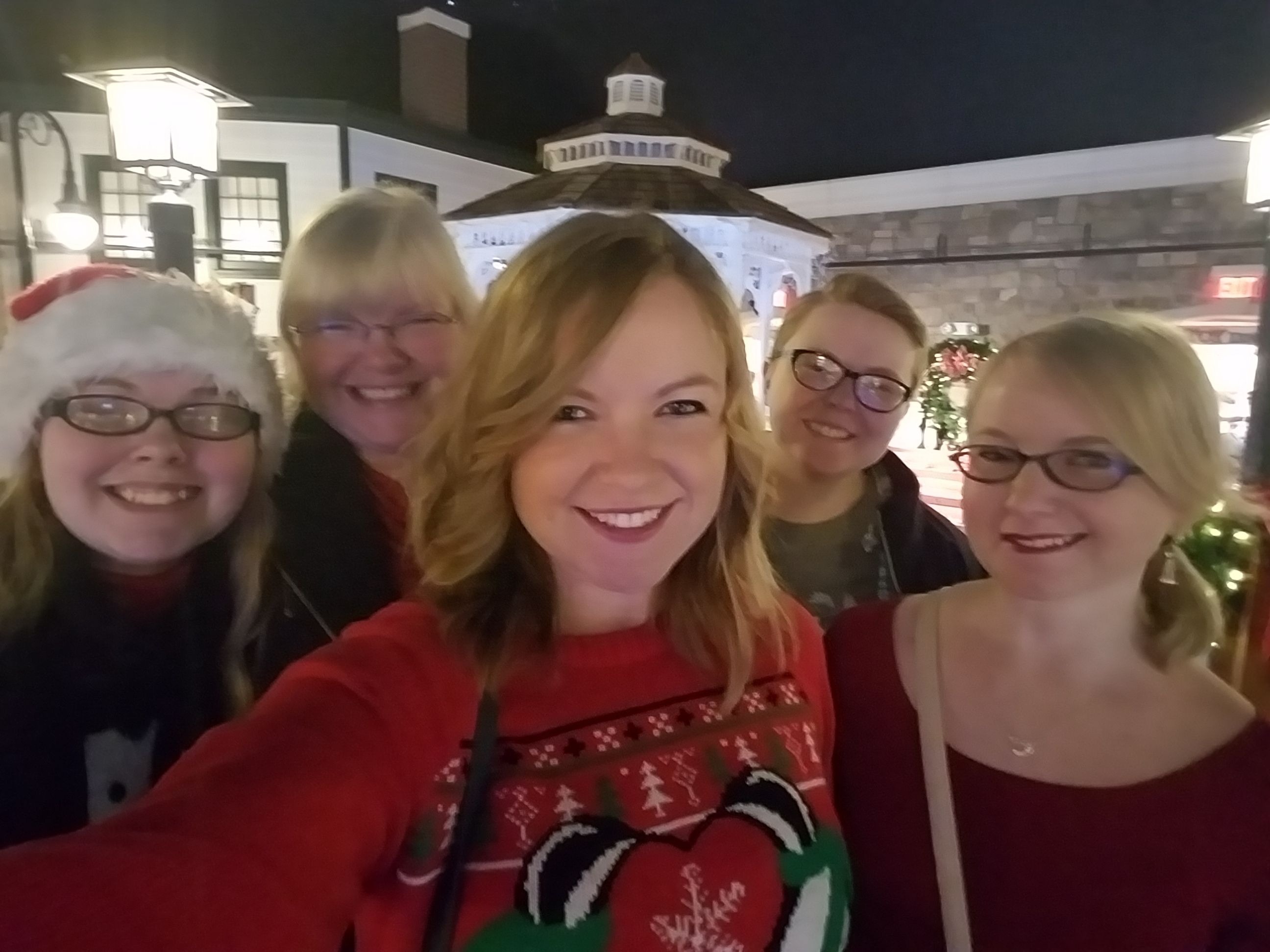 We love waking up to snow on Christmas but it rarely snows in December where we live, so every year on Christmas Eve, mom would find a way to make it snow. This year she drove us to Yankee Candle and had us stand in a specific place just before the snow machine came on to surprise us.