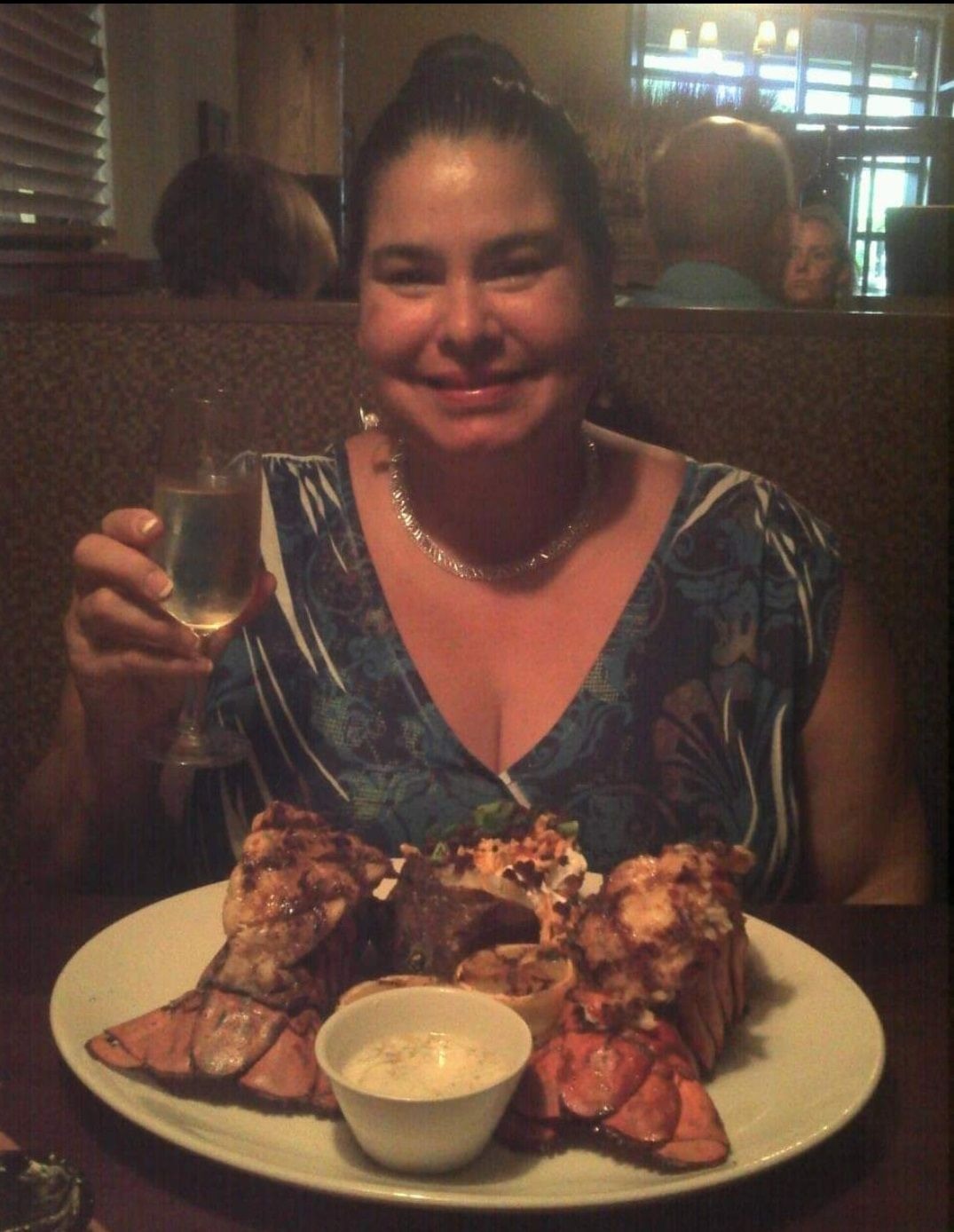 Elizabeth loved going to dinner and when it was in the budget I loved taking her to the nicest places. She was such a class act and here she is enjoying two lobster tails. Except for sushi, lobster was her ultimate choice. It brought me much joy and happiness to oblige.