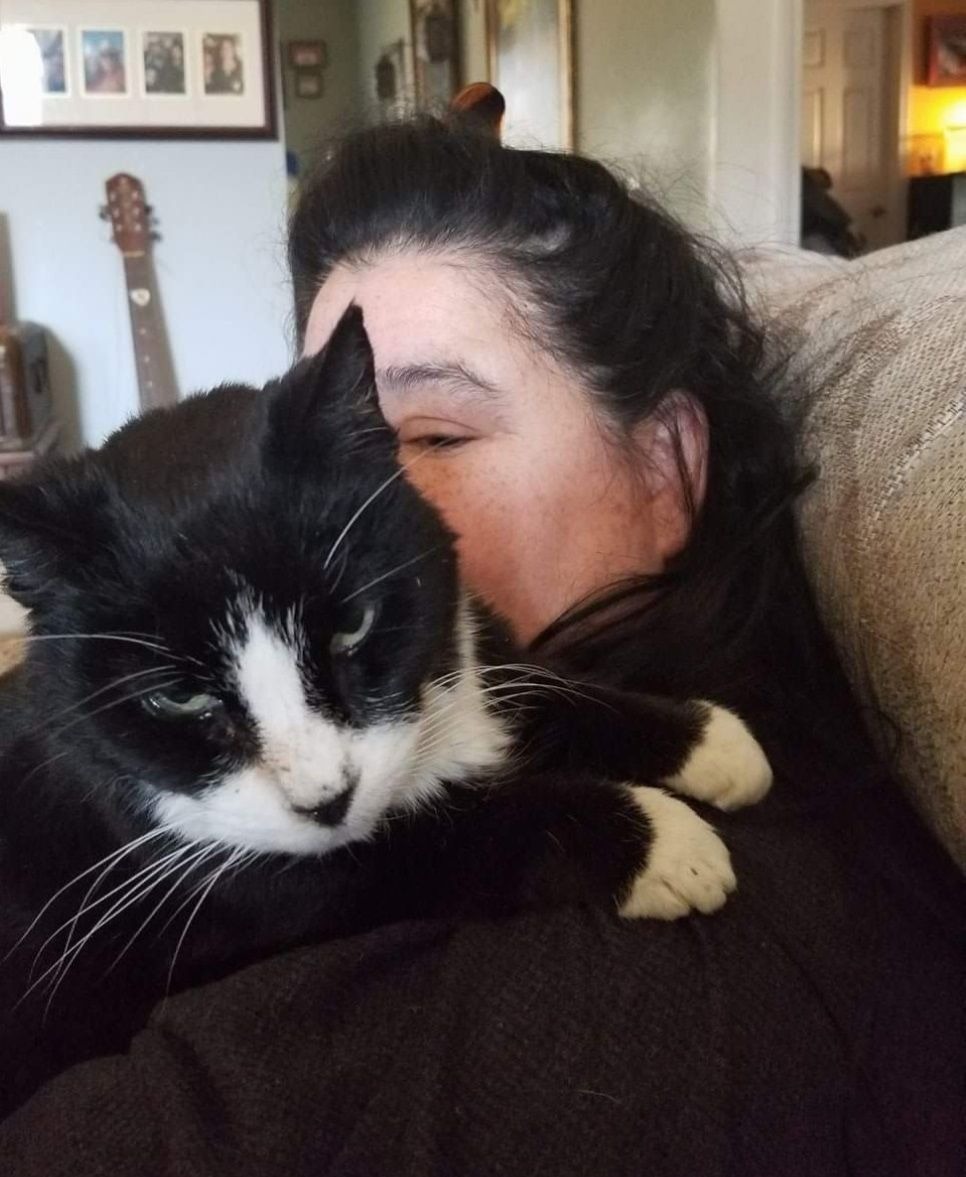 Elizabeth loved her animals. Here she is with one of her cats Mooshoo. She always had a cat named Mooshoo. When one would pass, the next cat we got would be named Mooshoo. She had her own special way of naming her pets.