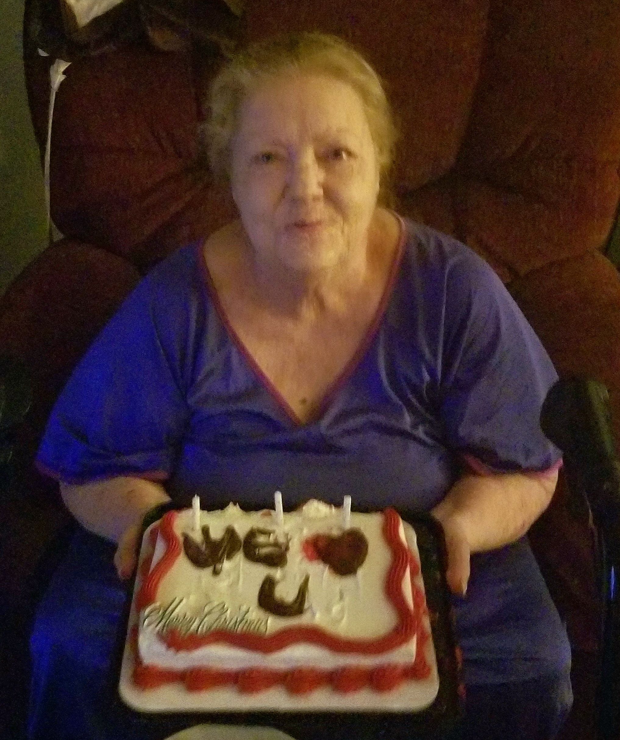 "Granna" enjoying a birthday cake made by her granddaughters. 