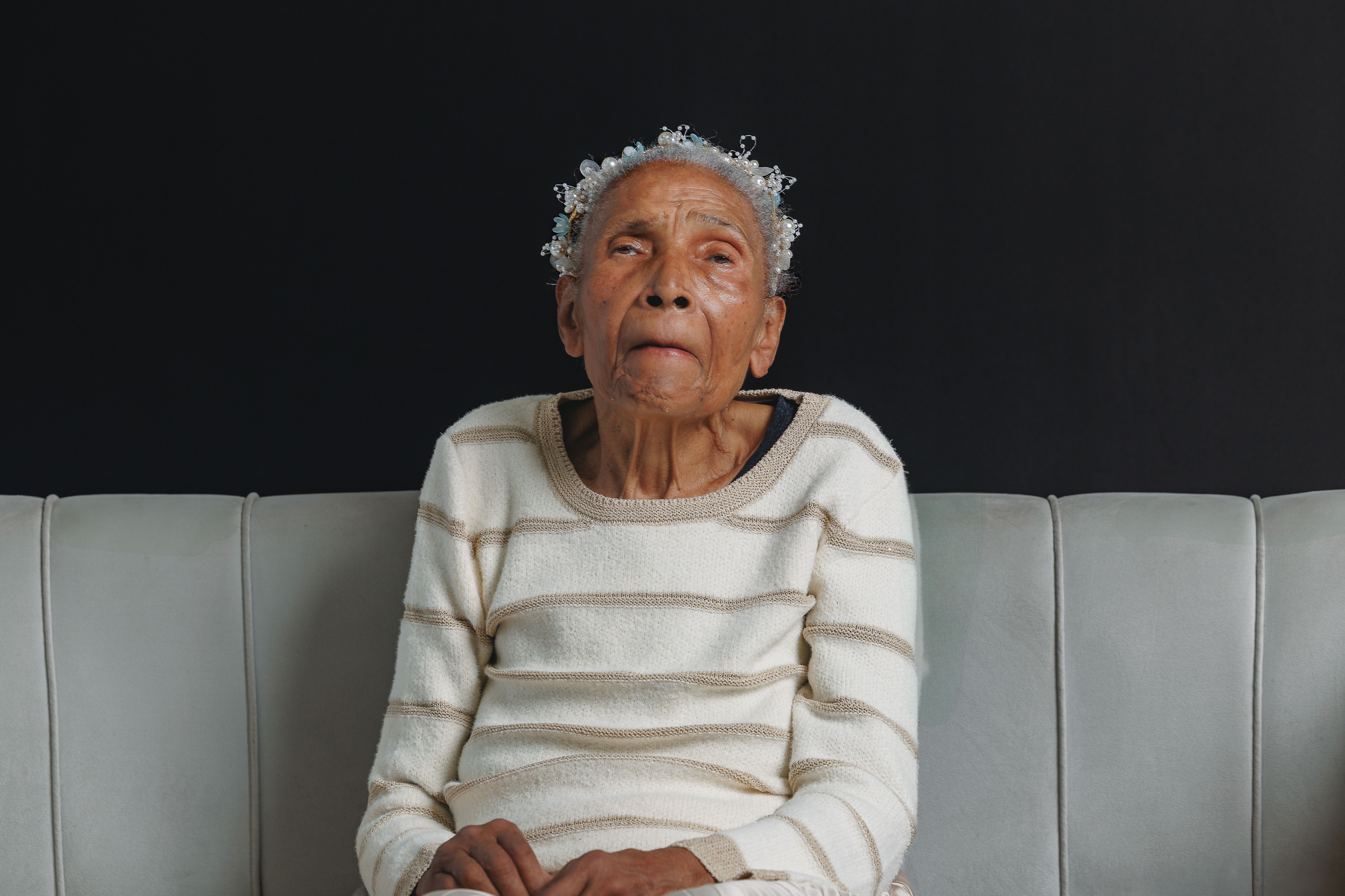 Gogo at a photoshoot for her 80th birthday.
