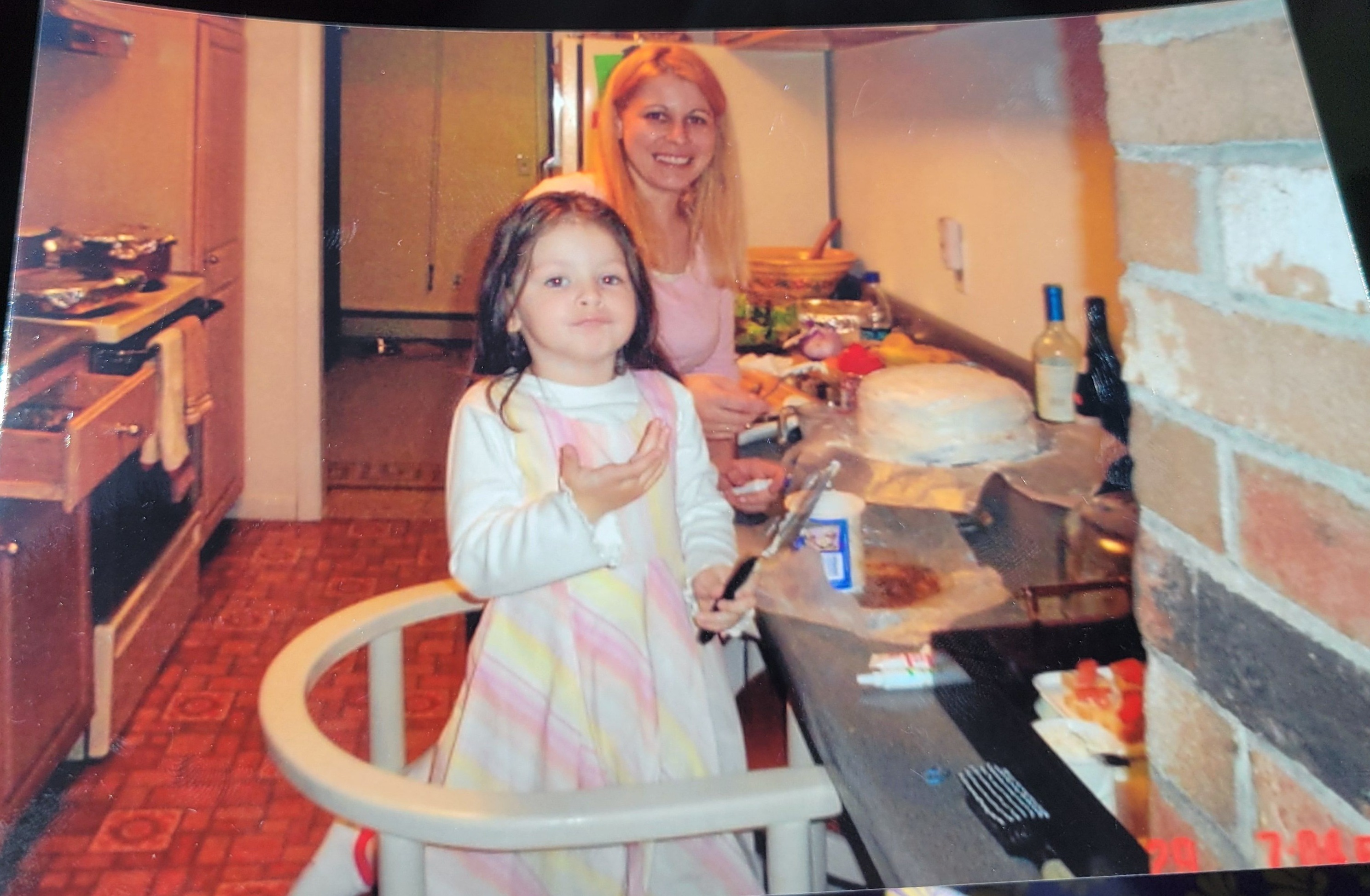 An older photo of my mom
And me baking a cake on stein lane house in Connecticut.