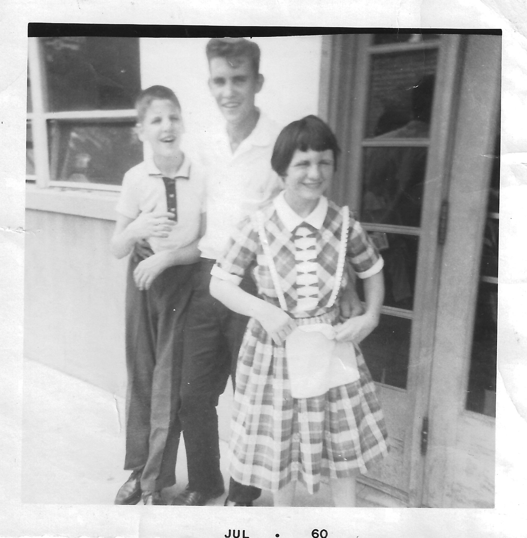 Fred, Joey and Louise at Bus Station. Fred boarding bus to join Air Force, July 1960