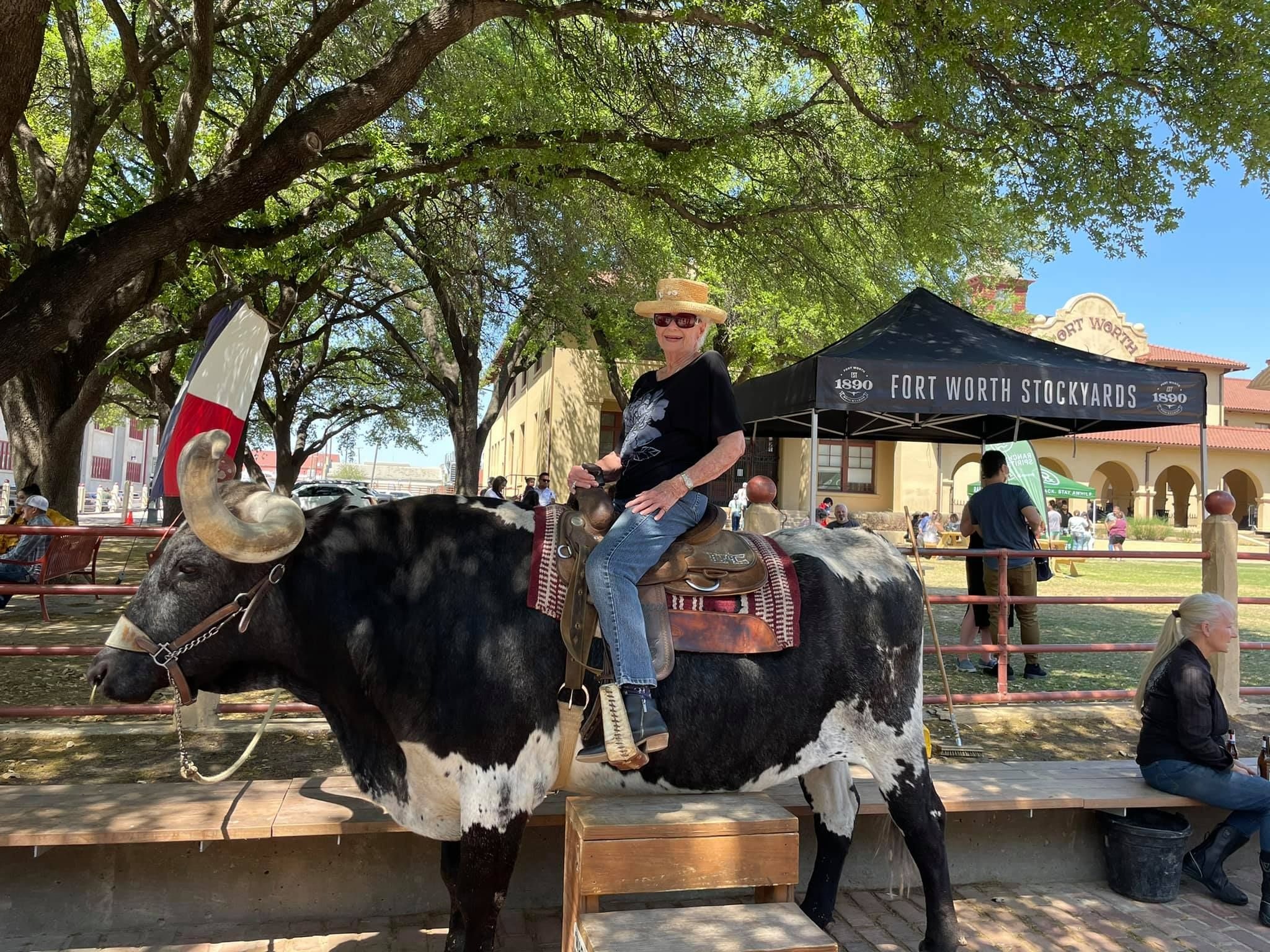 Carol on the famous steer in the Fort Worth Stockyards