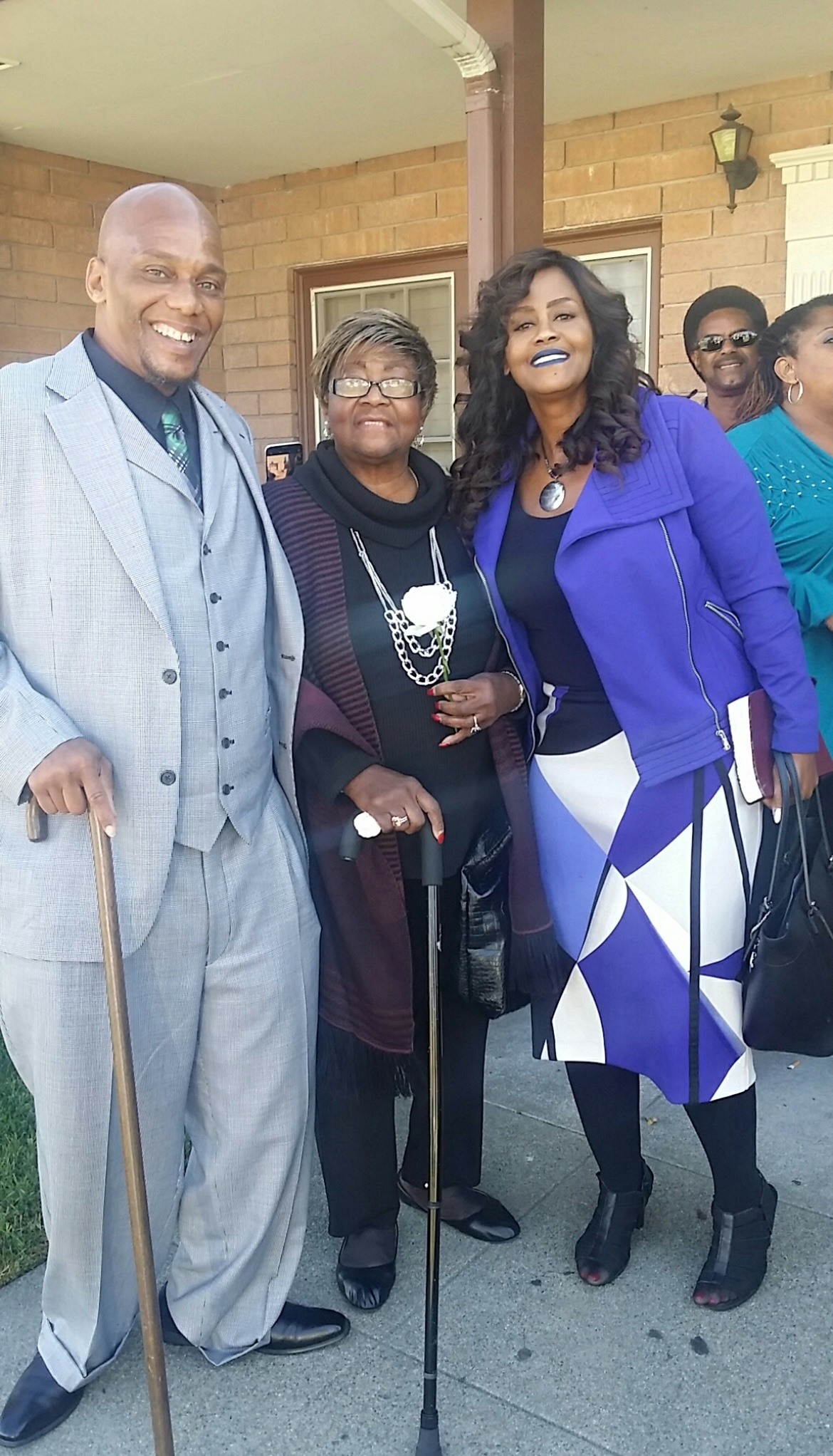 Ernest with his aunt, Frances, and cousin, Malika.