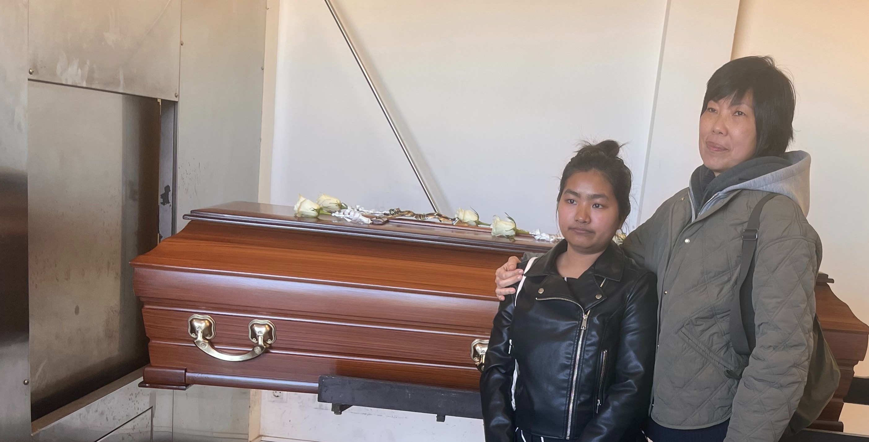 Ruby and I beside Mum’s casket.