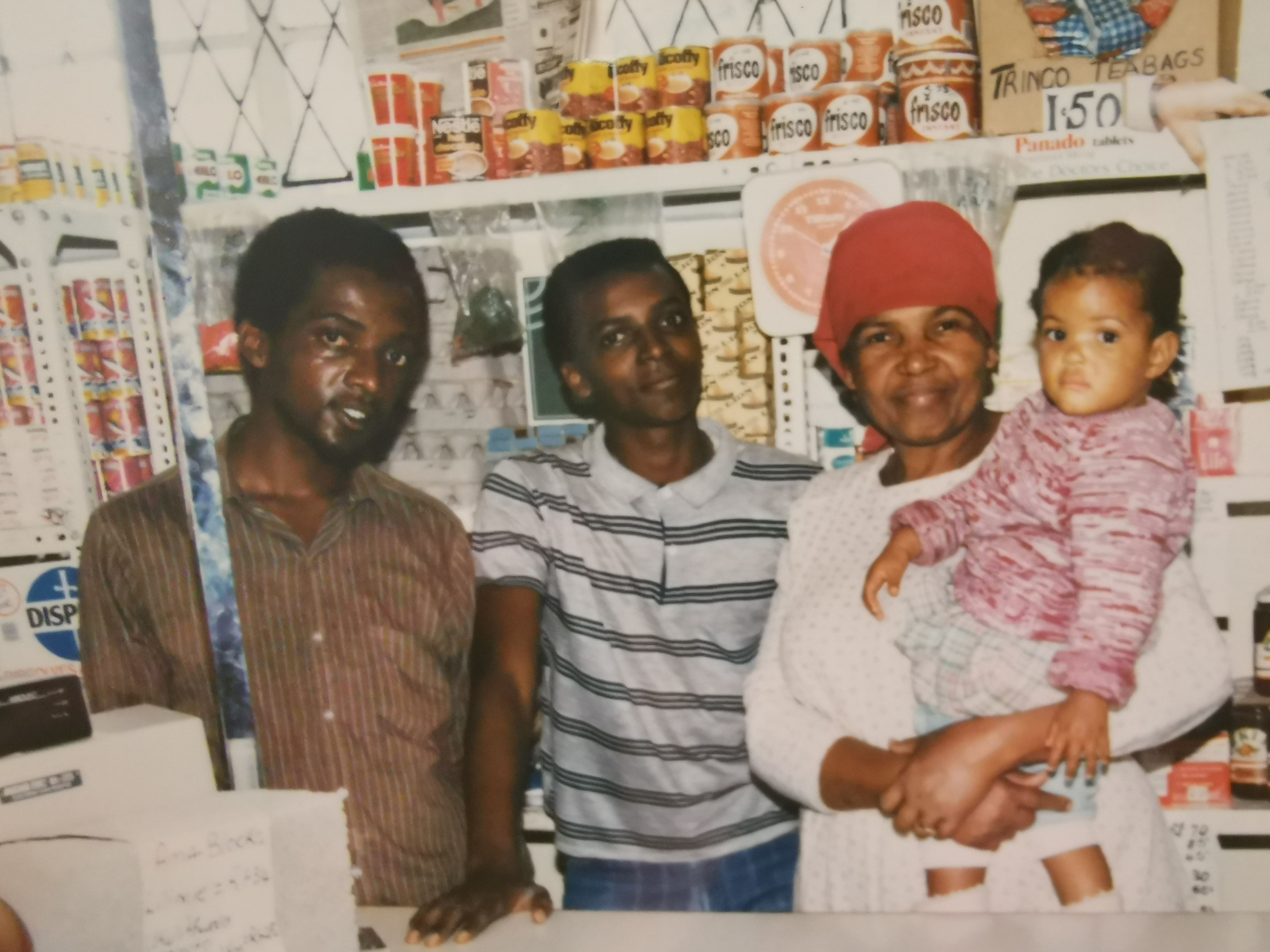 Gogozi with her sons and grand-daughter.