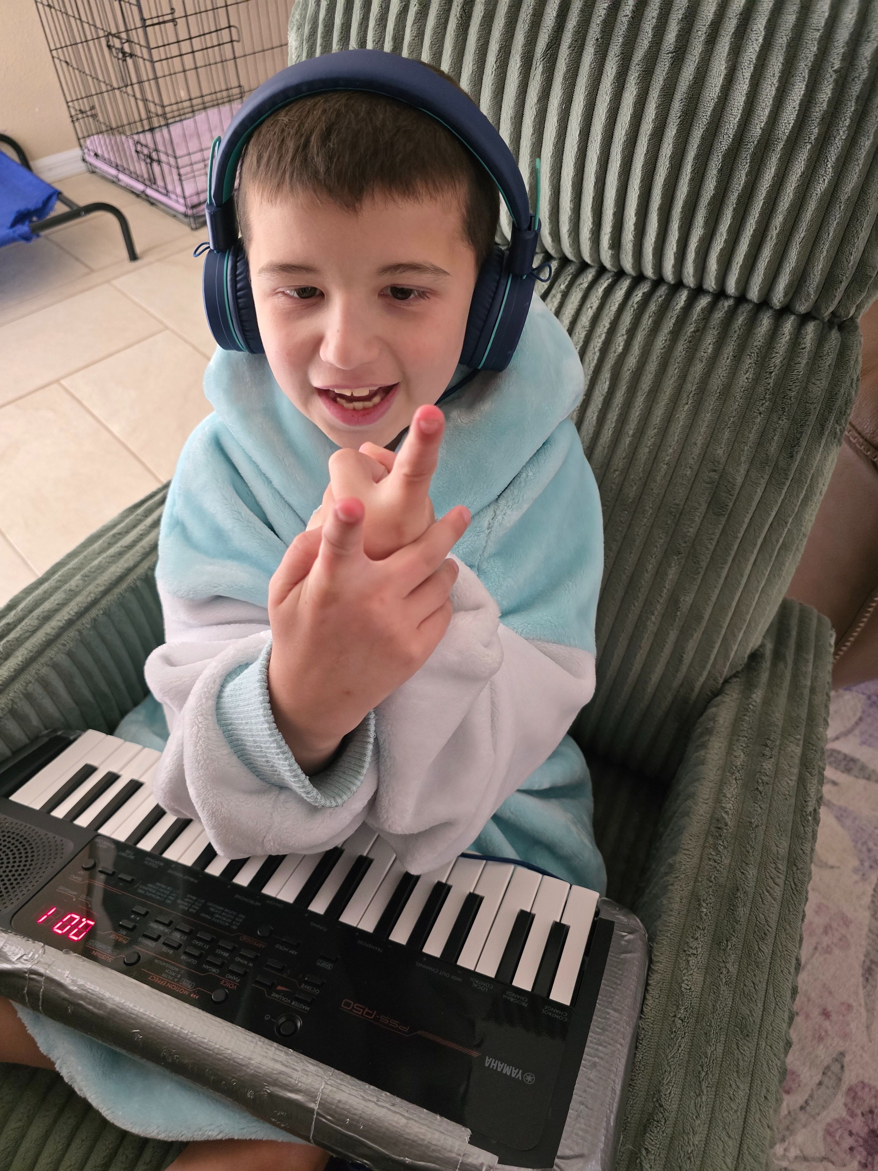 Piano man wearing his favorite snuggle hoodie