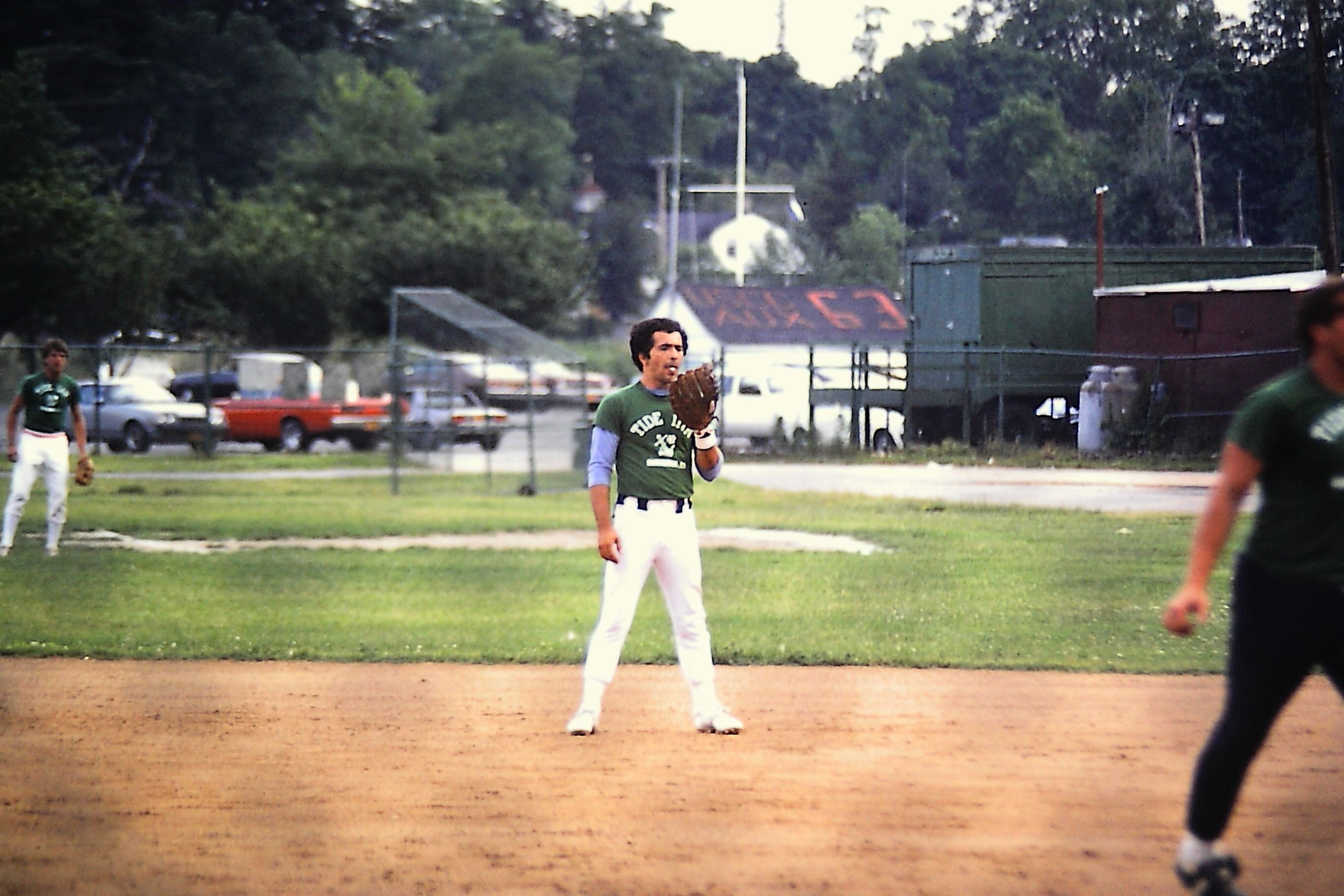 Franco playing softball for the "Tides" team