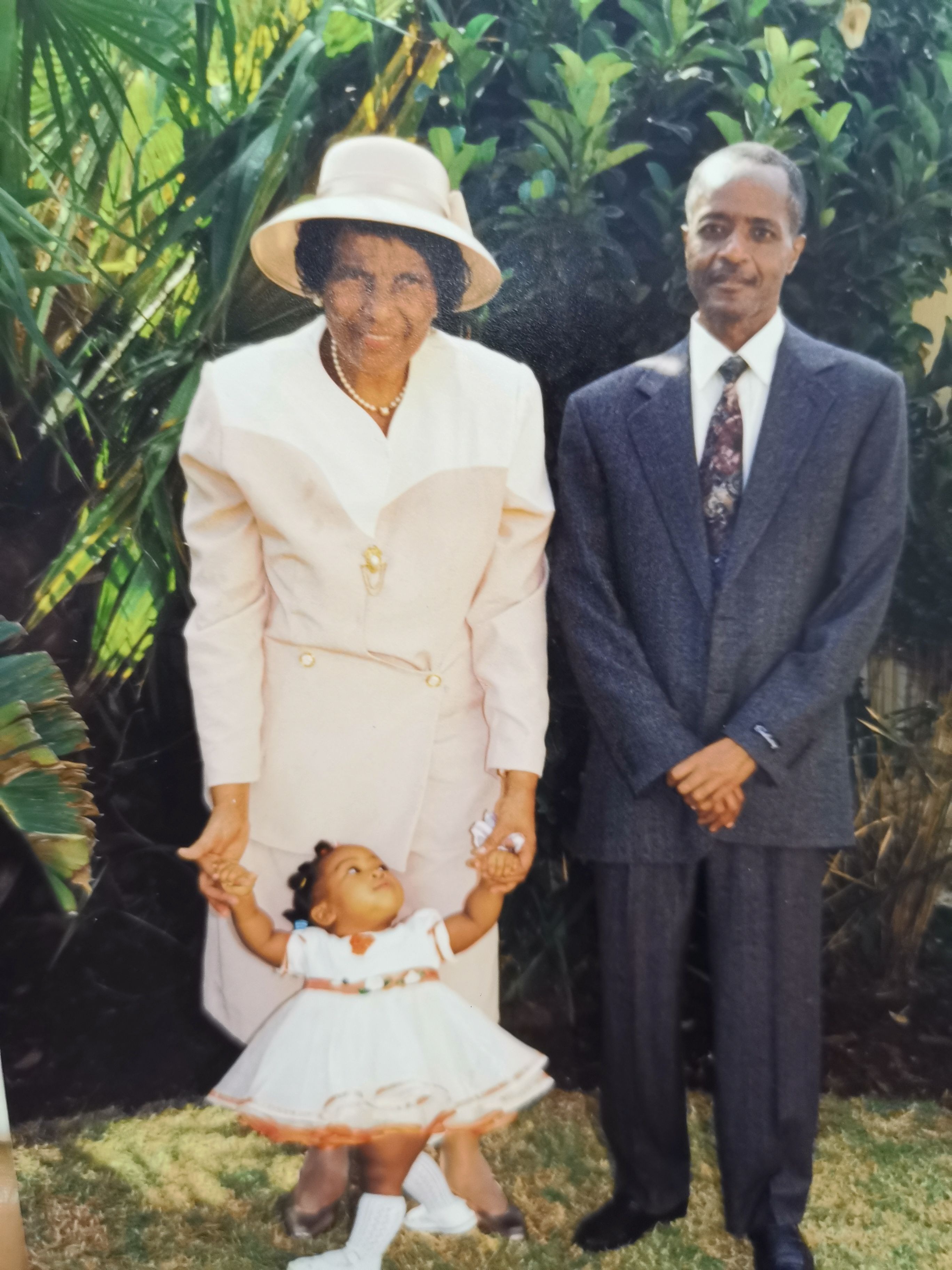 Nana with her husband and grand-daughter.