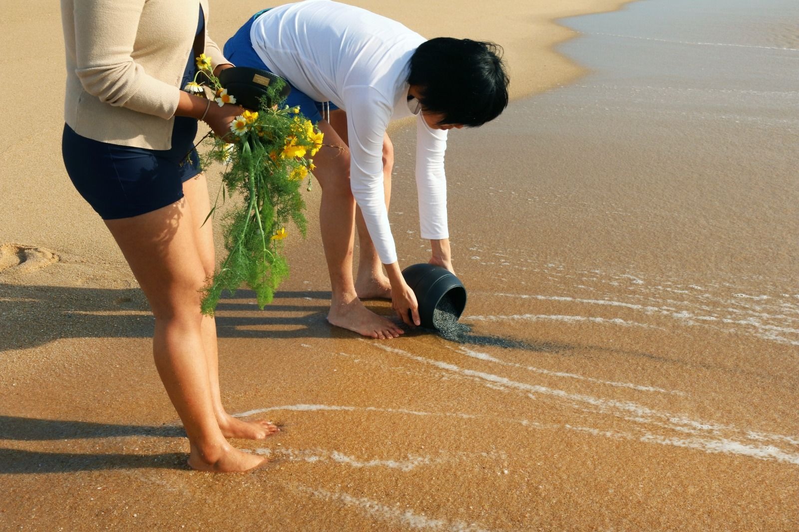 A final farewell — Mum’s ashes carried to the ocean, along the coast of Portugal.