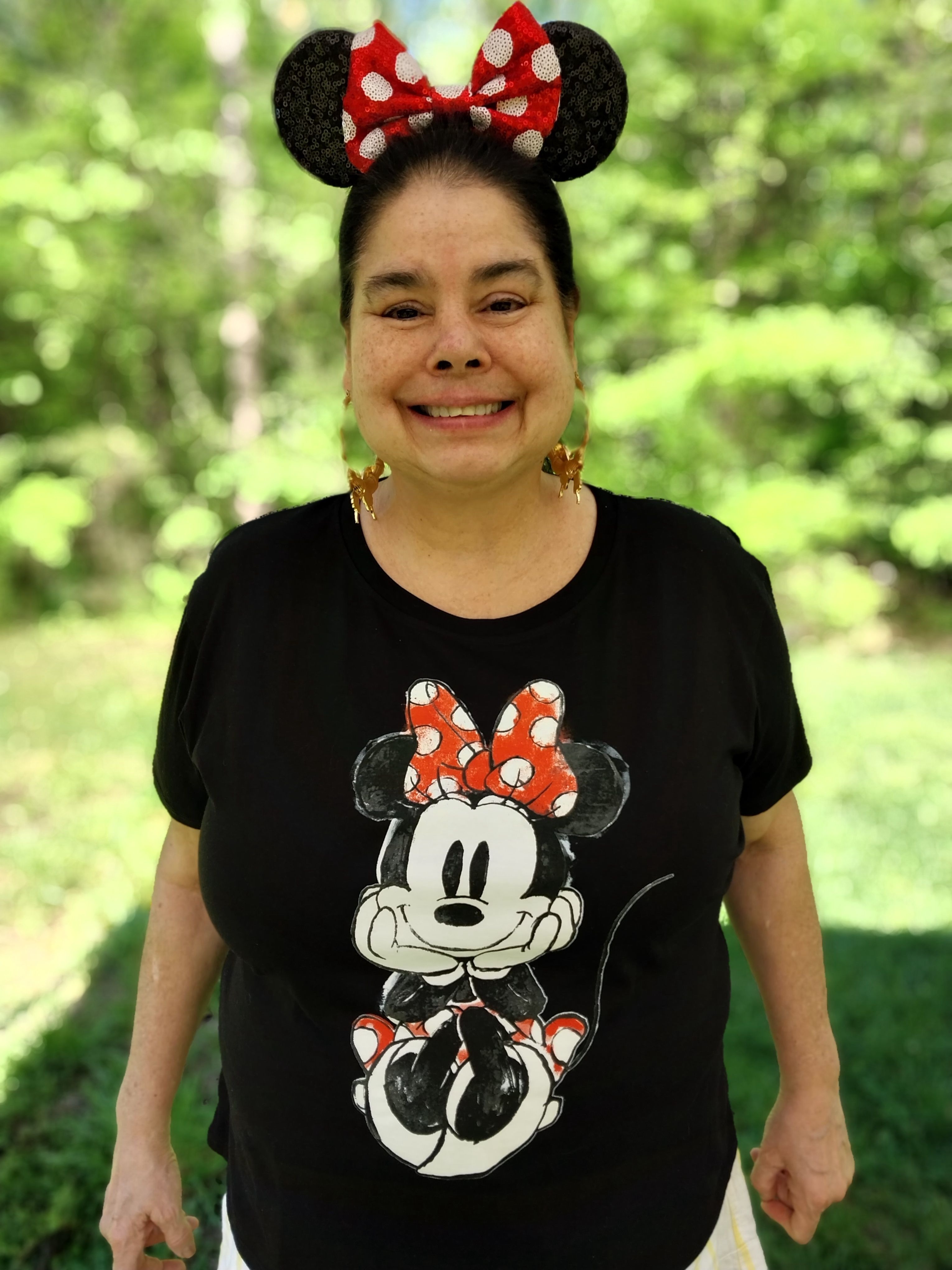 Elizabeth loved Disney and Minnie Mouse. I bought here these Minnie Mouse ears without realizing she had this shirt to wear. We laughed and couldn't wait to take the perfect photo.