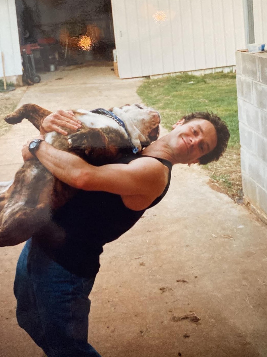 This was probably in 2000, Karl & I were visiting a horse ranch & he was playing w the bulldog of course.