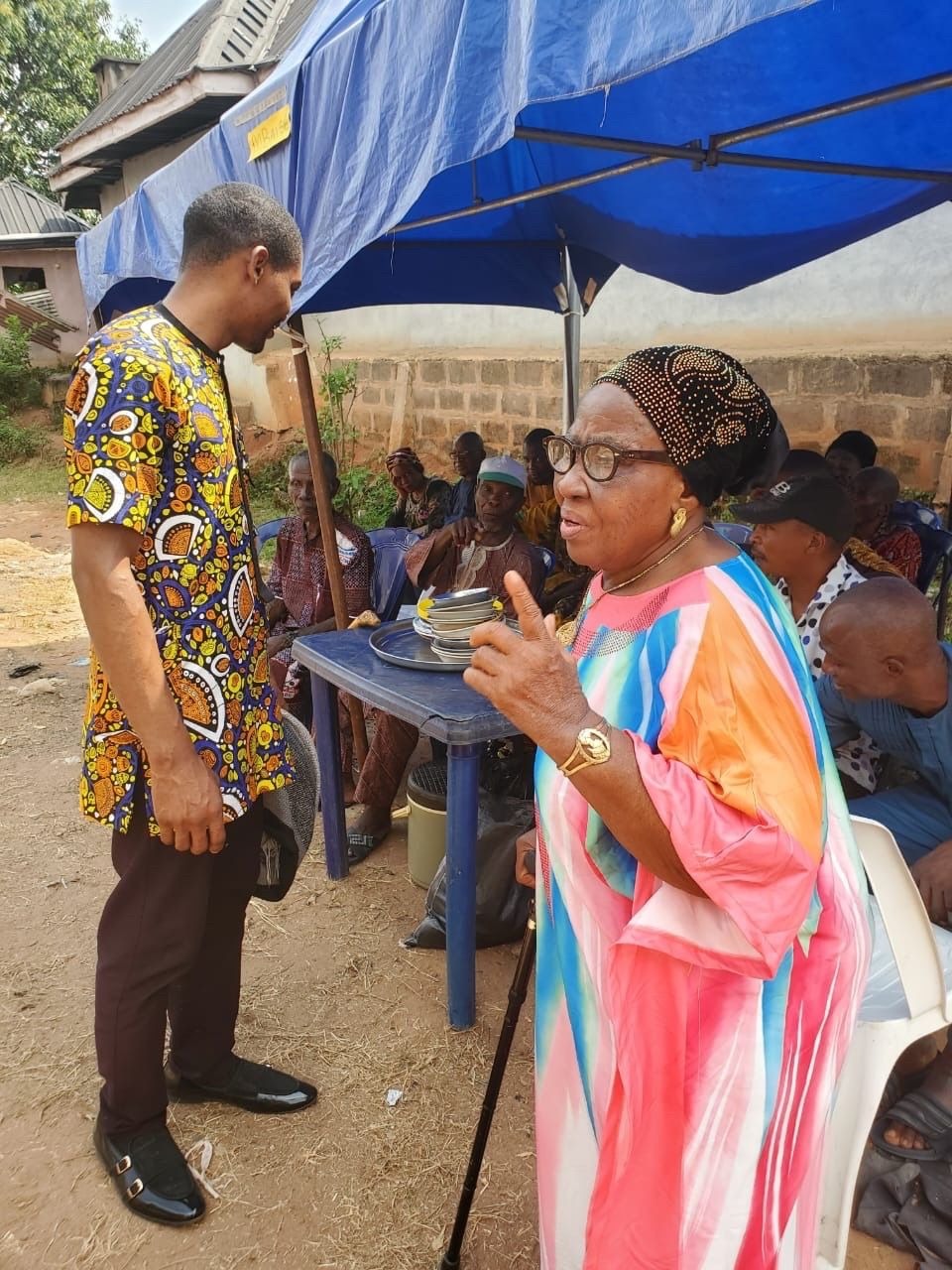Mama at the burial ceremony of her brother, Dede Saint.