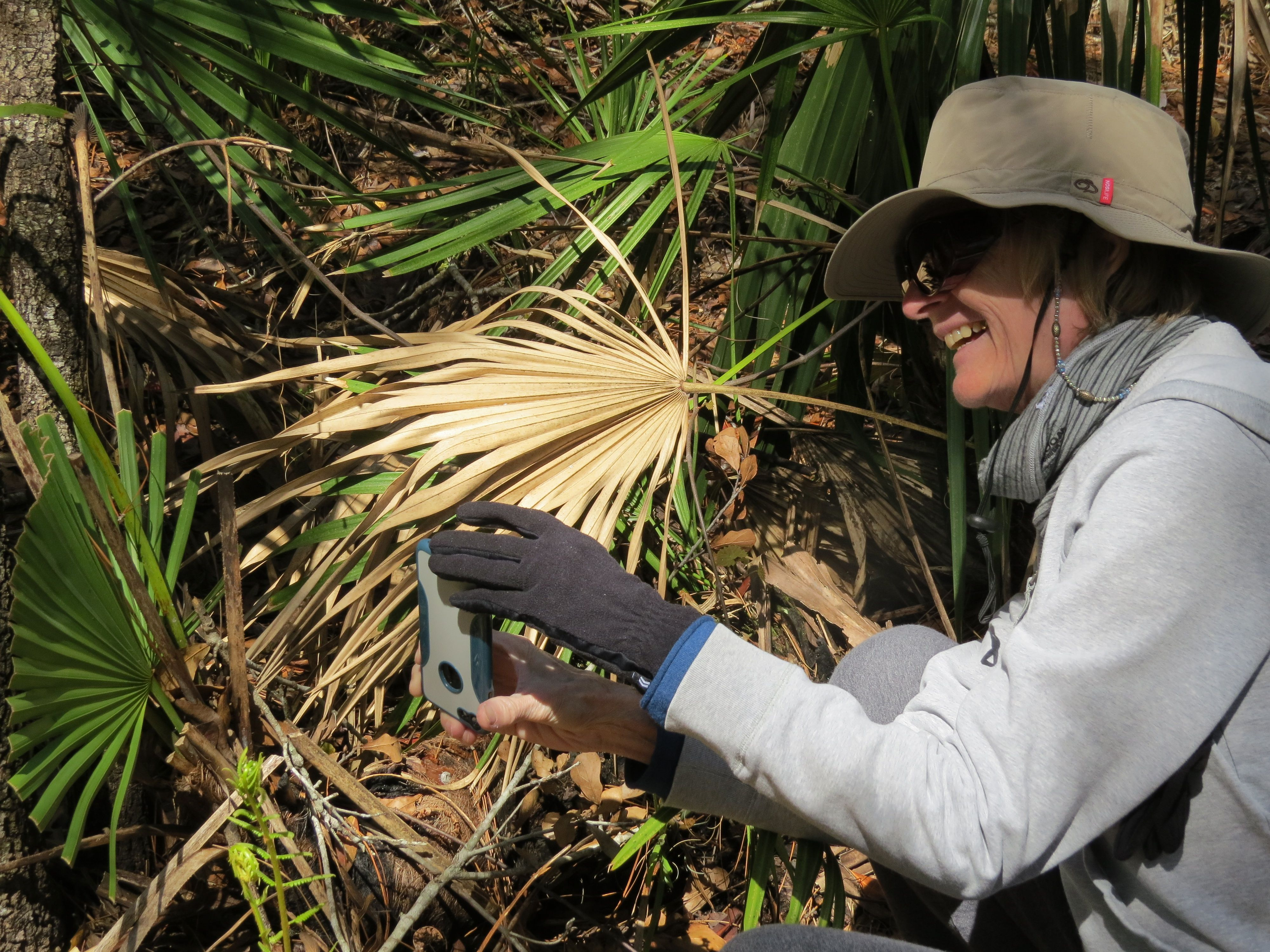 Darlene taking a photo at Sand Lake in Wekiwa Springs State Park, March 2018. She always had such joy being out in nature. And she enjoyed interacting with the people we met along the trails.