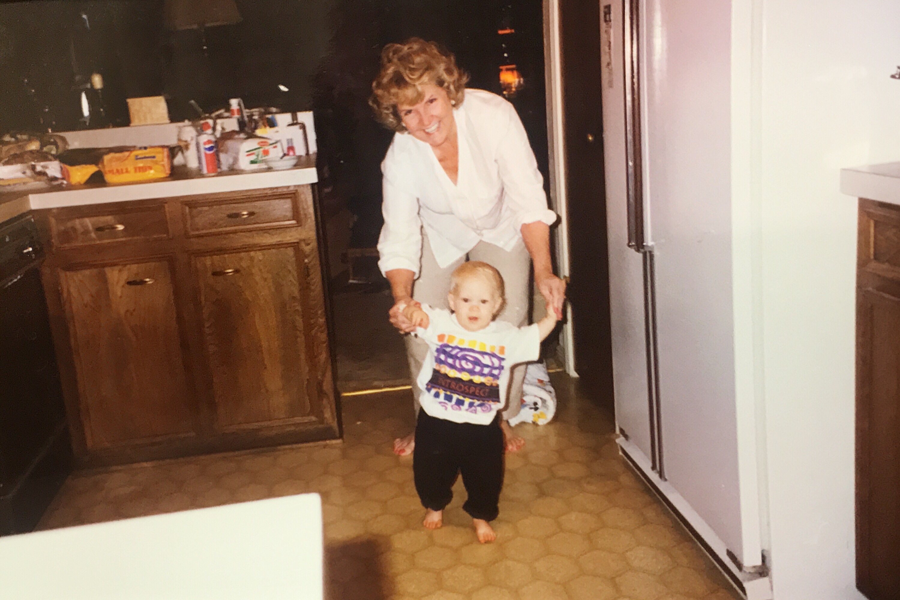 Granny didn’t just leave us with memories, she left us with a legacy. The kind of stories you tell over and over, because they’re too good not to share. She loved with everything she had, fiercely, protectively, and often with a side of sass.

Take, for example, the time I broke my arm in third grade. The doctor casually lifted it, then dropped it, asking, “Does that hurt?” Before I could answer, Granny, who was across the room, locked eyes on him like a heat-seeking missile. If looks could kill, that man would’ve needed a doctor himself. I may have been in pain, but I was more nervous for him.

Granny’s legacy is more than just stories, though. Sometimes when I’m absentmindedly kicking my foot or drumming my fingers on the steering wheel, I think, “Well, there she is again.” She’s woven into our habits, our humor, our stubborn streaks, and yes, our beauty routines. Because if she taught us anything, it’s that you never leave the house without your hair done. Ever. Not to mention that a napkin or paper towel hates to see me coming. 

But above all, Granny taught us about love. The kind that’s brave, empathetic, dignified, and resilient. The kind that lifts people up, defends what matters, and never lets you leave hungry. 

Thank you, Granny. For your fierce love, your sharp wit, your steady presence, and for the countless ways you shaped who we are. We miss you dearly, but your mark on our hearts is permanent. 