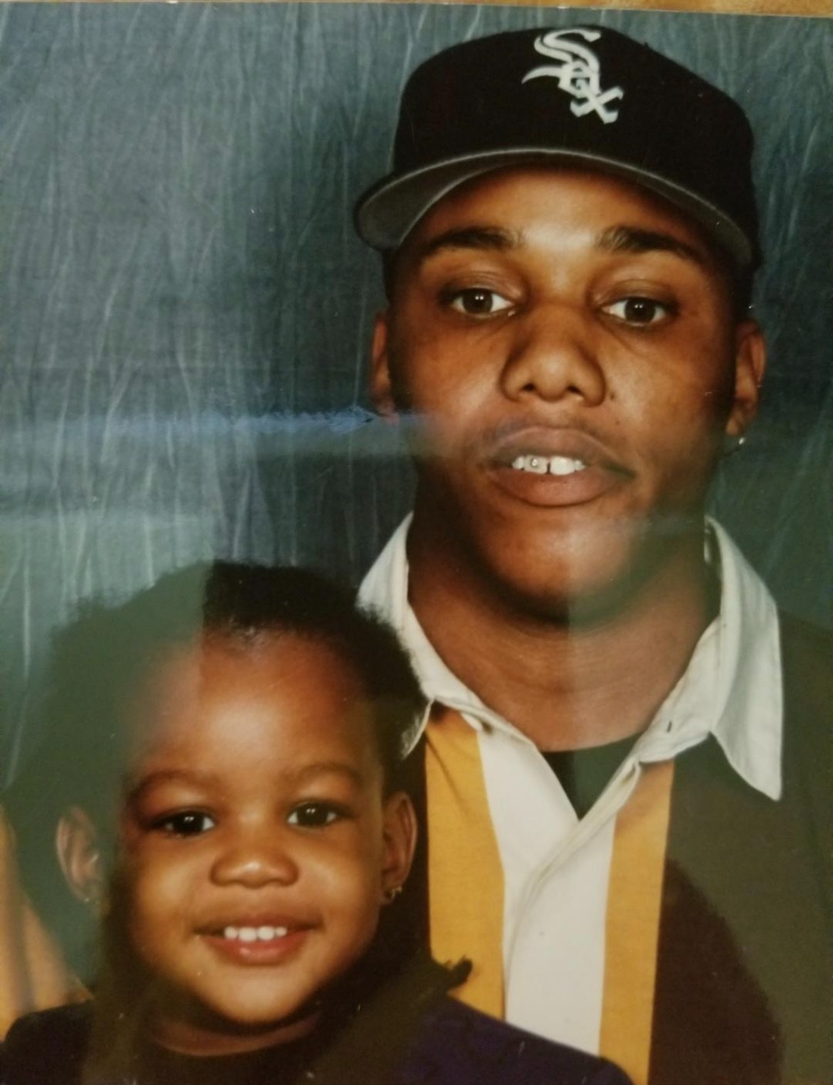Ernest in the 90’s with his daughter, A-Nisha.