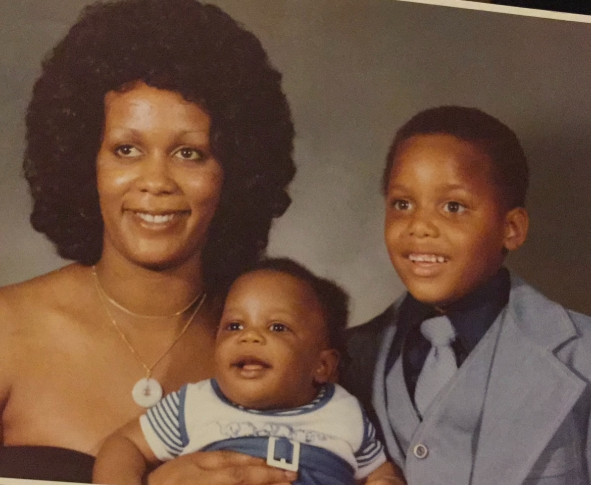 Ernest with his mother and little brother.