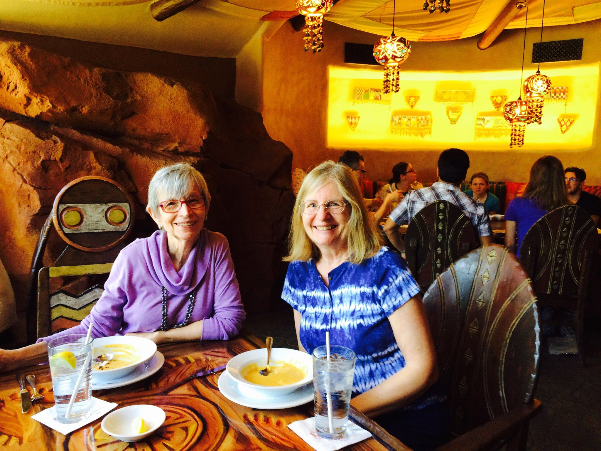 Darlene and I dining at Sanaa restaurant at Disney's Animal Kingdom Lodge with giraffe, zebra and other African animals grazing outside the picture window. Enjoying the illusion that they could walk right up just like the beautiful grey-crowned crane on the other side of the glass.