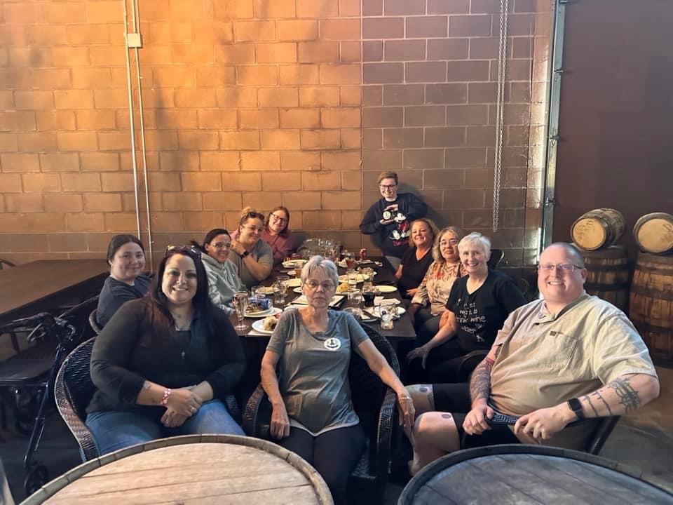Athletic staff and event assistants at a gathering for Jill. We will all miss her so much. She was such a bright light in our lives. Rest in peace Jill ♥️
