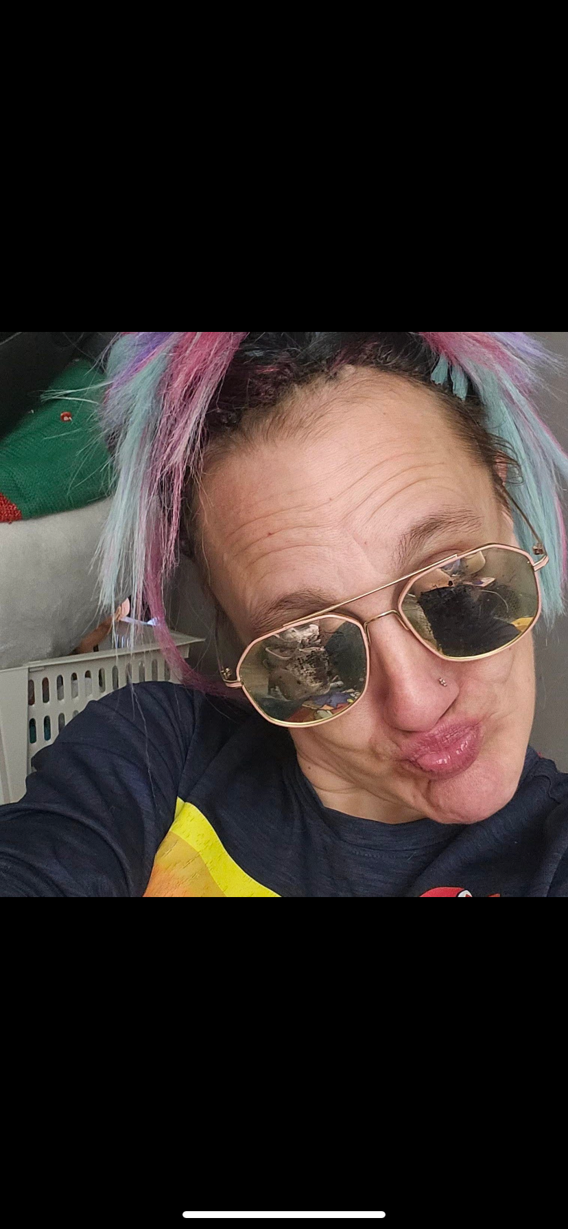 Always had colorful hair. It was basically her staple