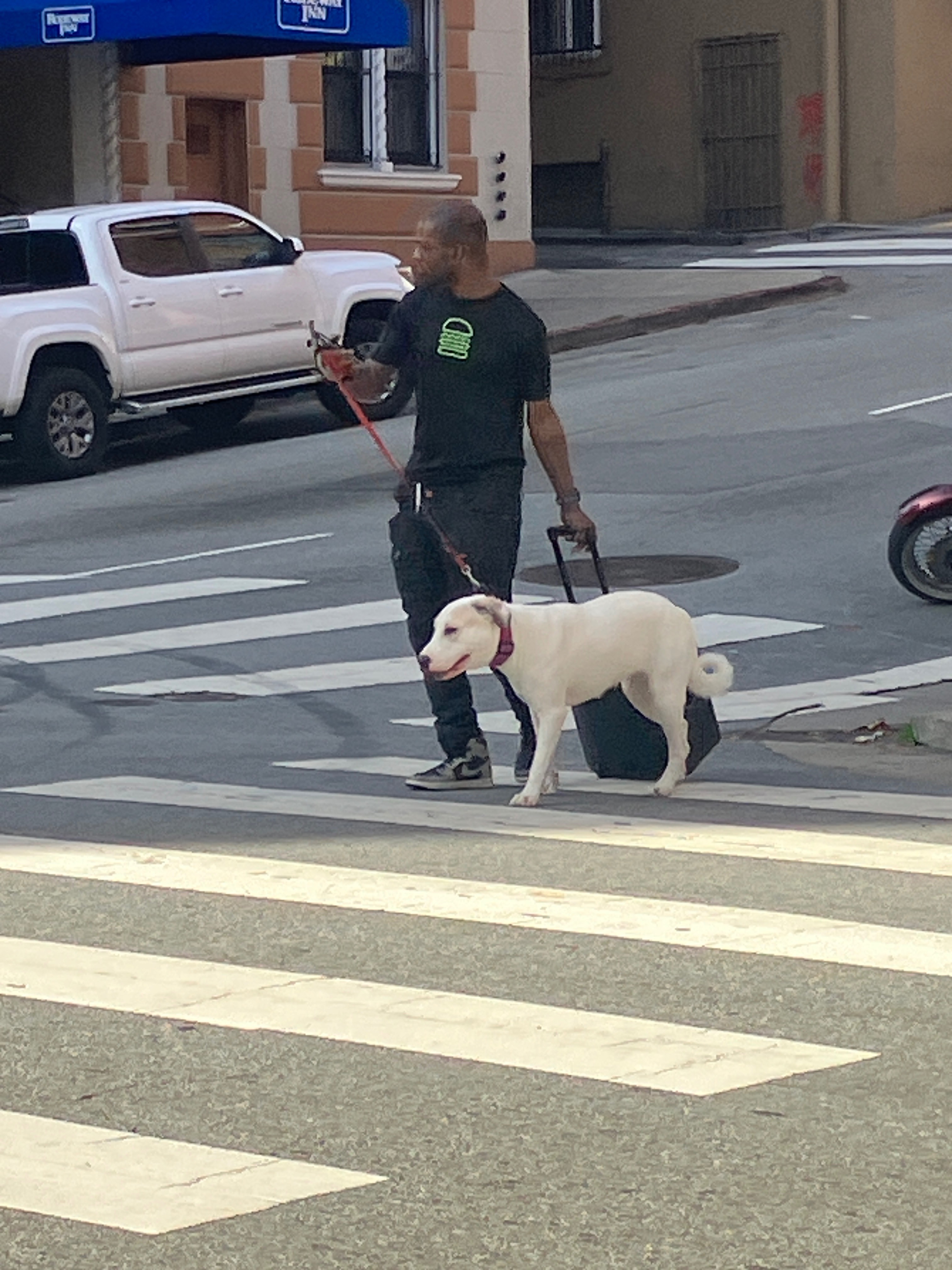 Wesley and his dog on Post St in San Francisco