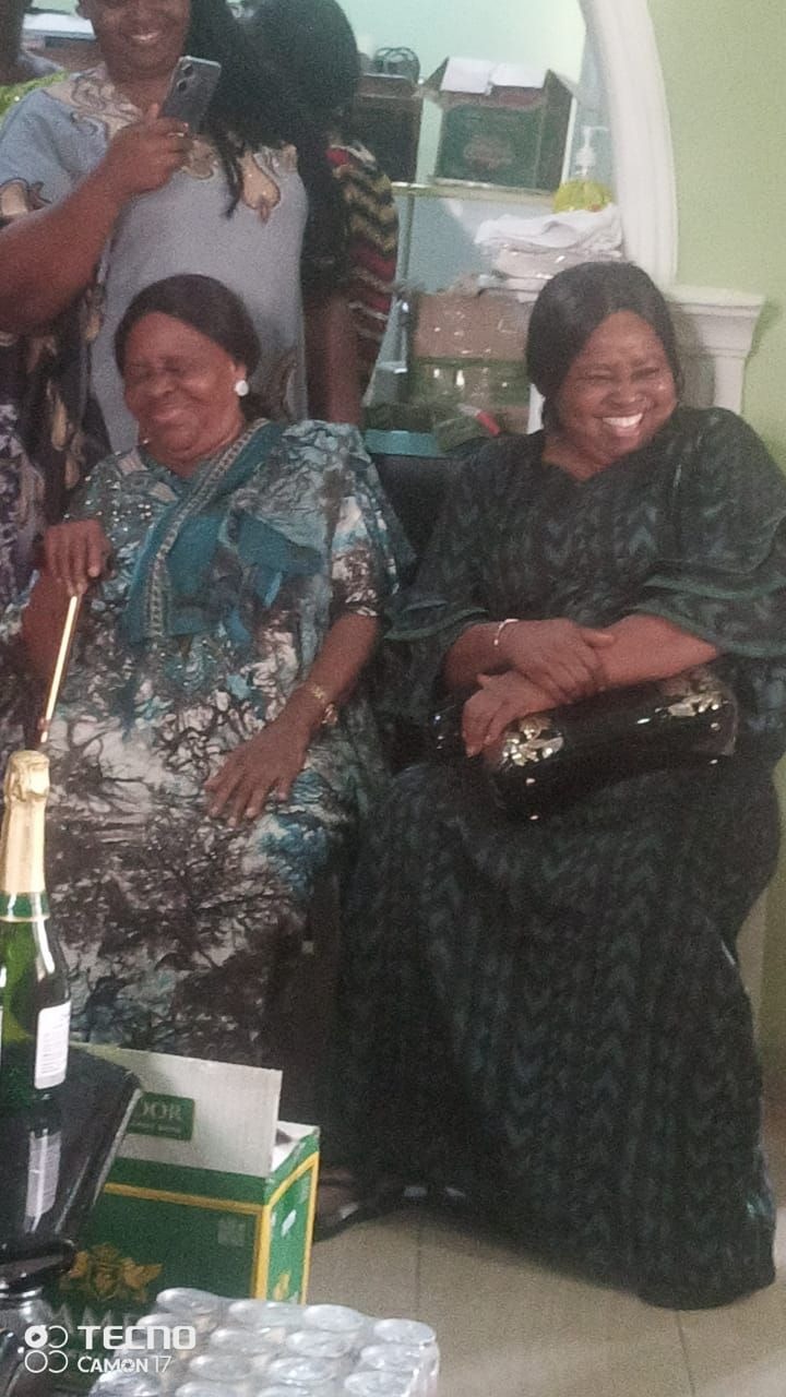 Mama with her first daughter at her granddaughter's traditional marriage ceremony.