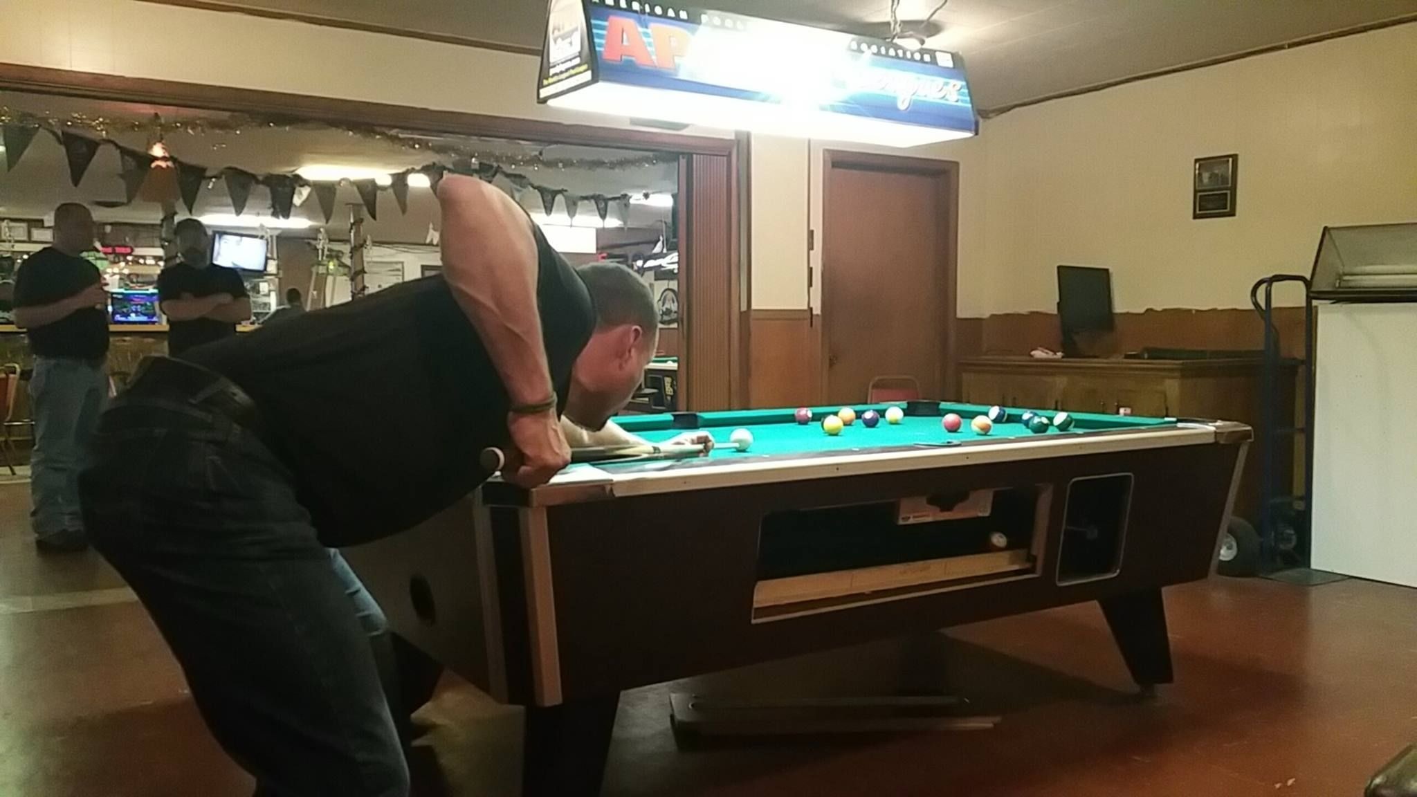 Doing what we did! Shooting pool at the Putnam VFW, just a minute away from his house. Adam played on a masters team for several years out of this bar. He loved competing, and man he was a good sport. People LOVED playing pool with Adam because of his easy-going nature and excellent sportsmanship. He really excelled at the game in our area, he was fun, and he never took it too seriously.