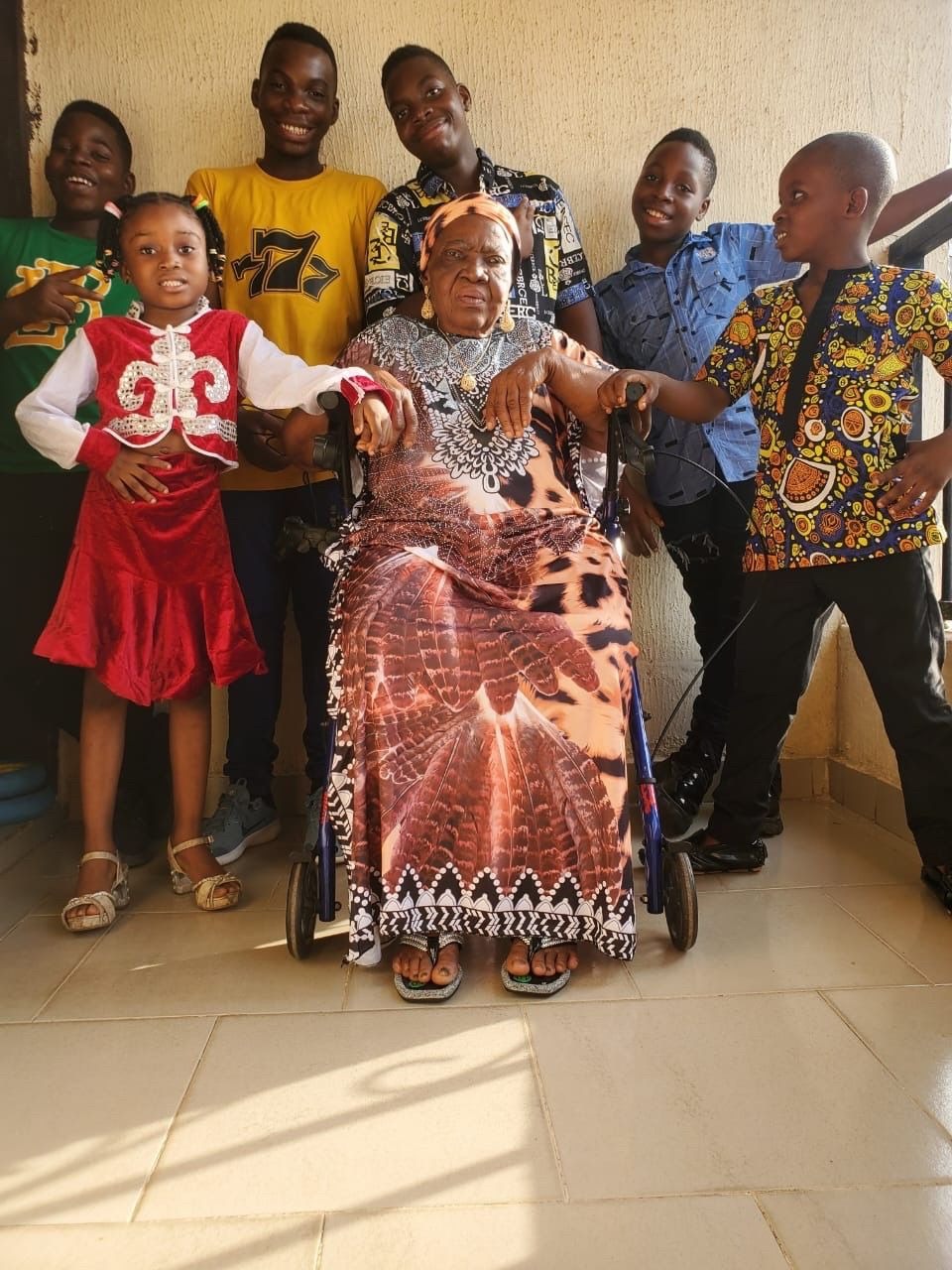 Mama with some of her grand-children, Chinemerem, Chimezie, Chibuike, Chimdi, Chukwunyerem and Chimamanda.