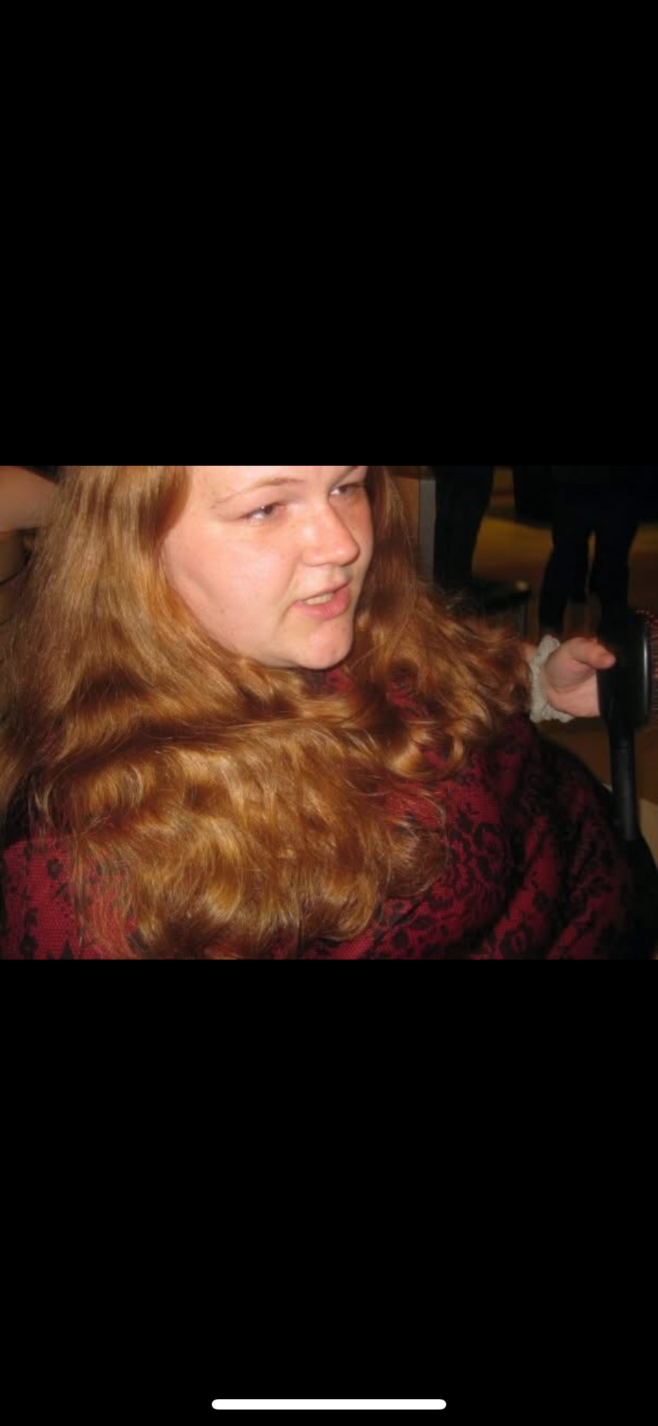She had beautiful long red hair I was envious