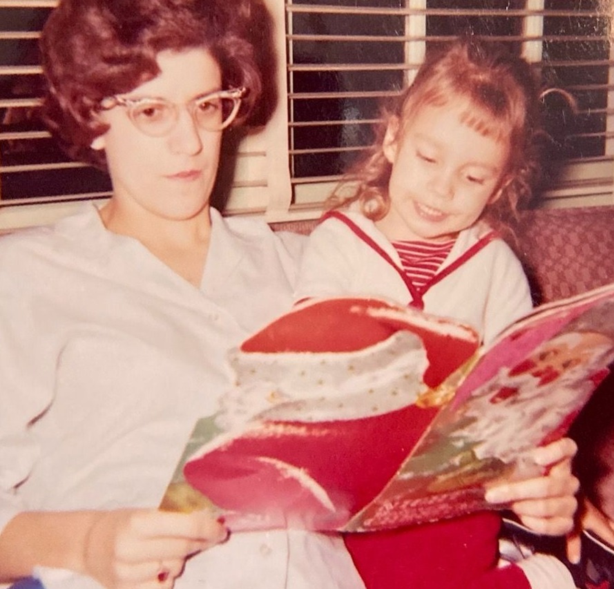 Jean Ann reads with her eldest niece, Cathy