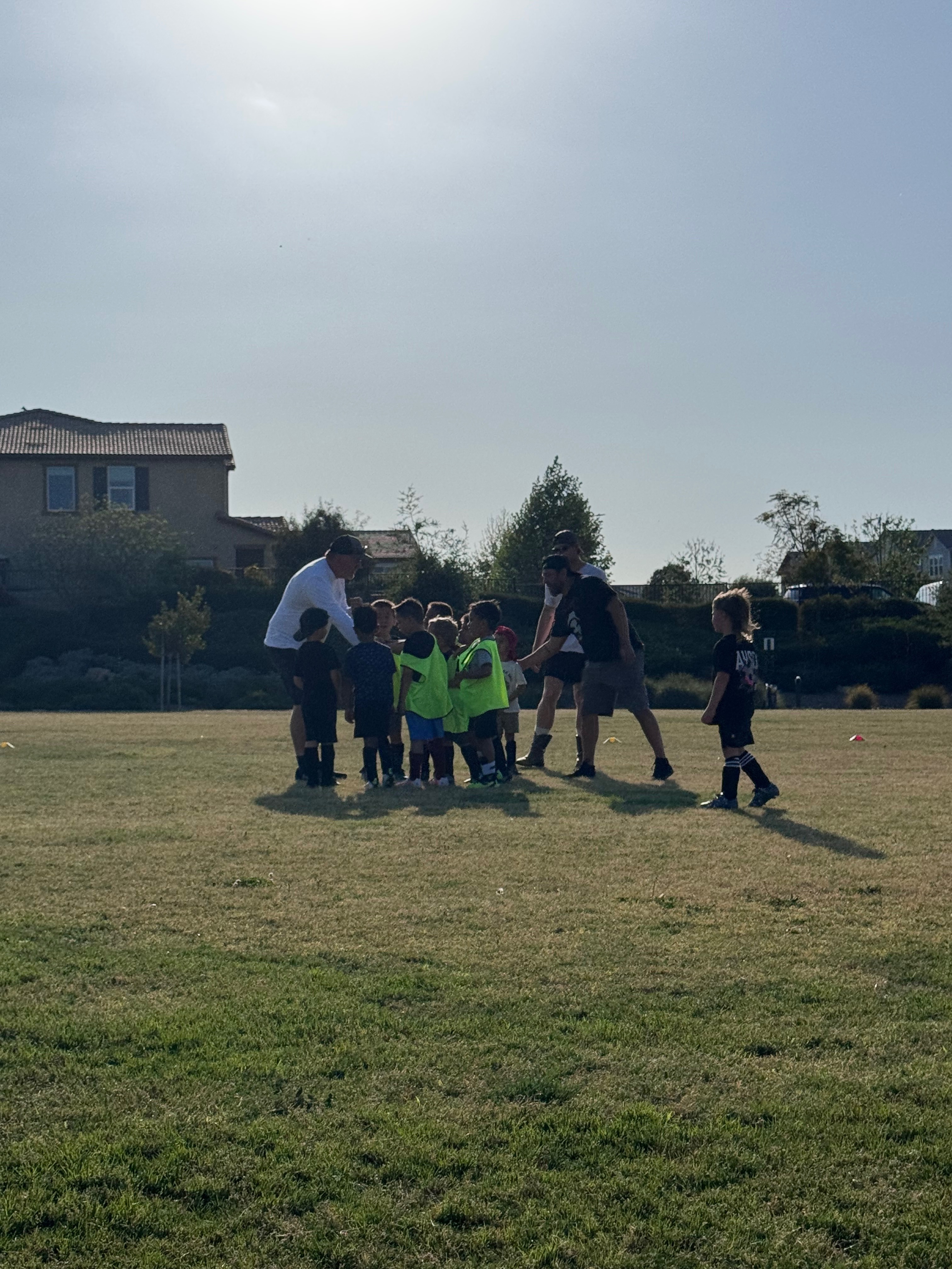 Coach Ben hand out ice cones the last soccer practice! Always finding a way to motivate the kids 