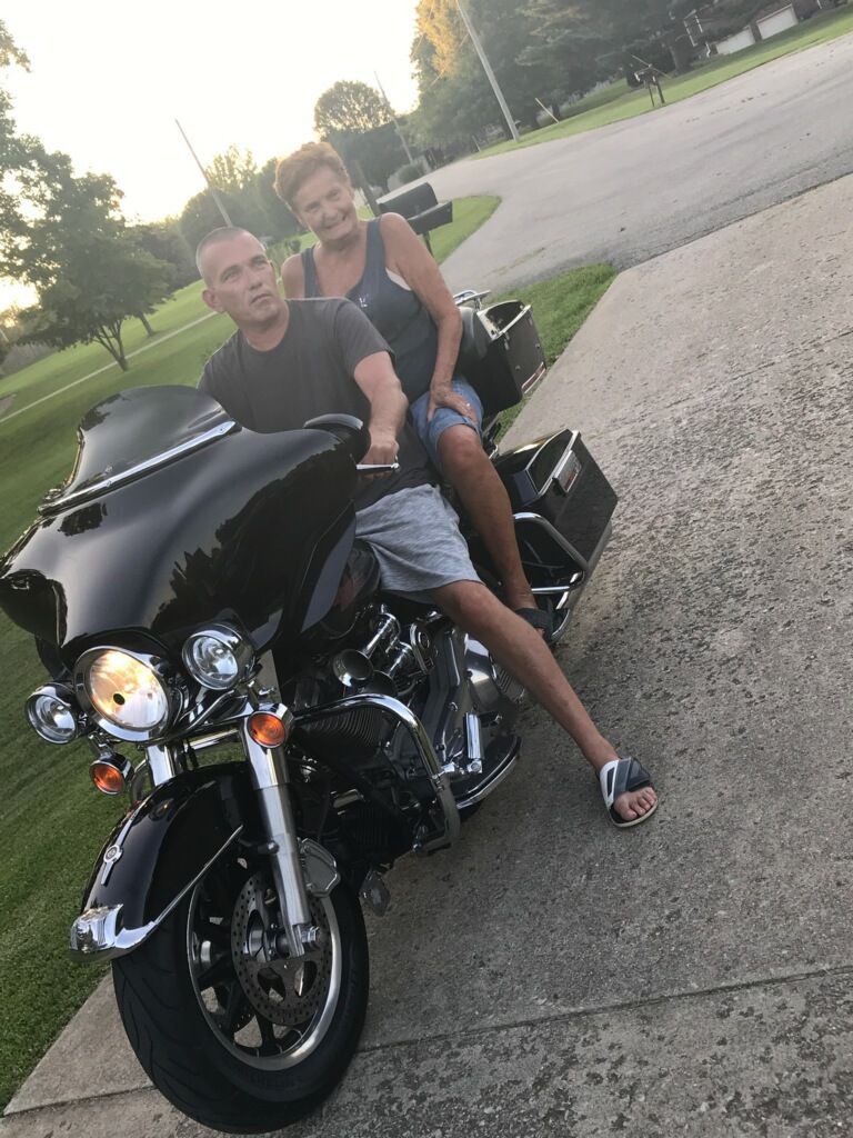 Mom and Tim on the harley.