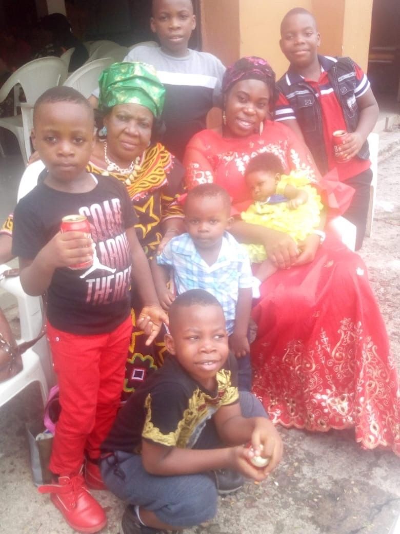 Mana with her daughter-in-law Chinonye and some of her grandchildren during the child dedication of one of her grand-daughter, Chimamanda.