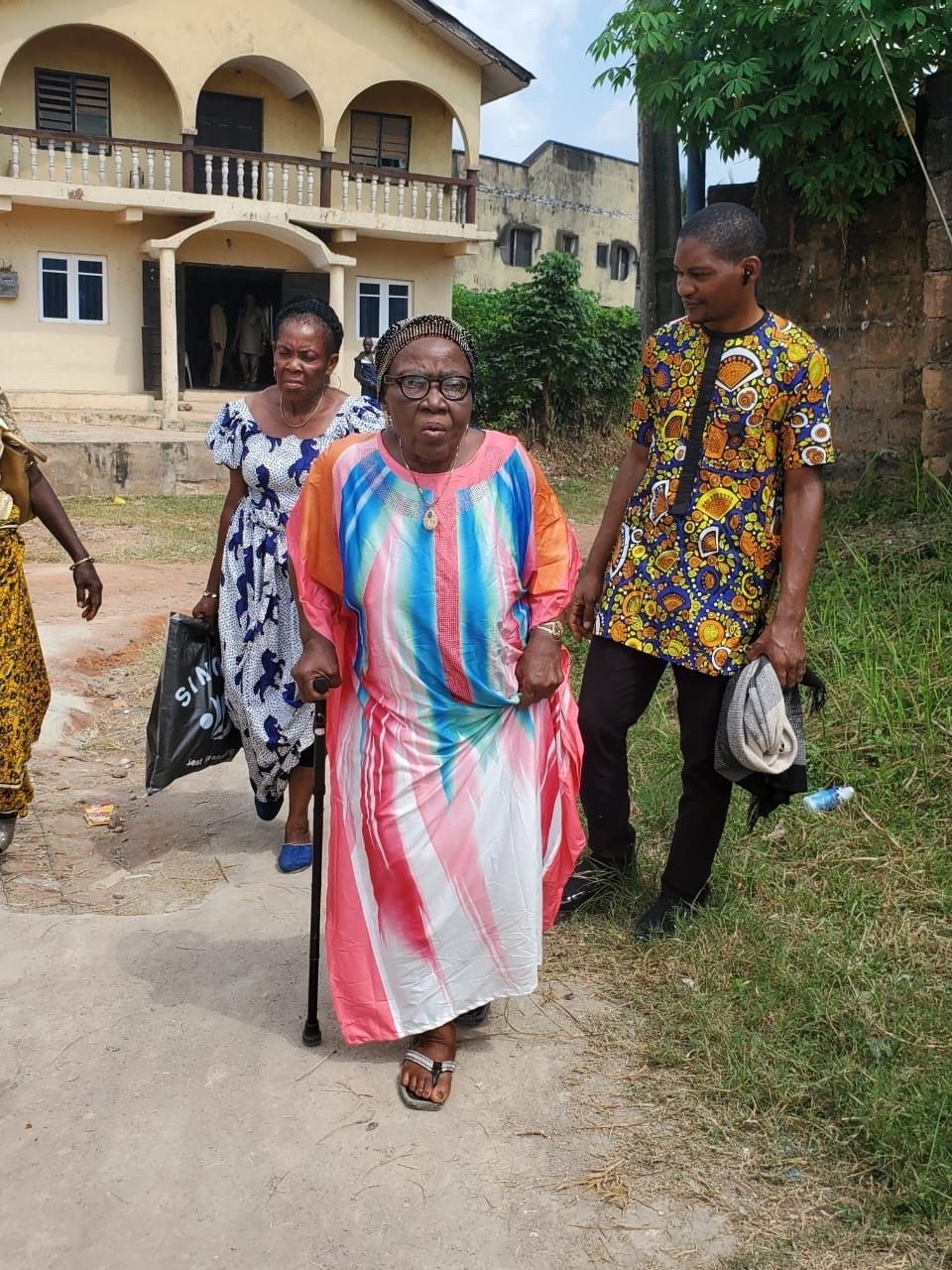 Mama at the burial ceremony of her brother, Dede Saint.