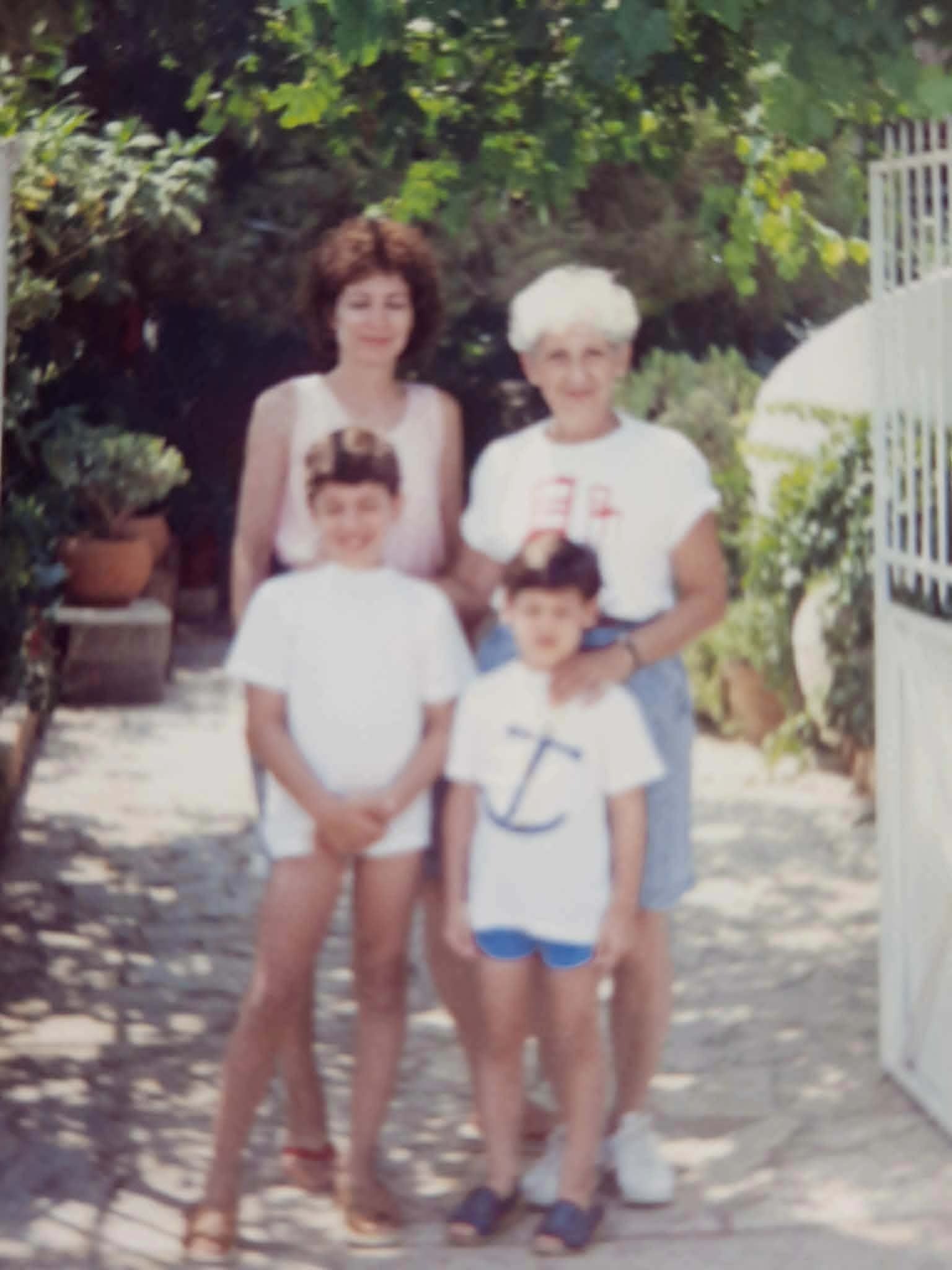 Nonna with the young Tsirozidis family in Greece.
